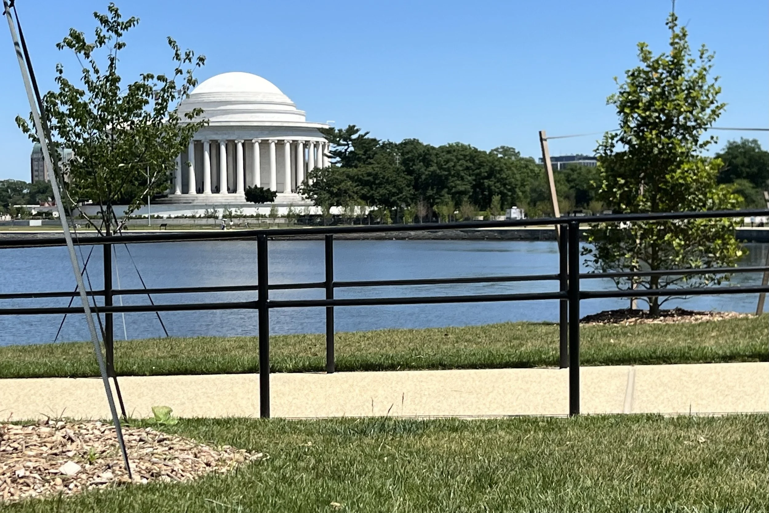 Jefferson Memorial across the water near the Tidal Basin in Washington, DC, viewed from the waterfront near Hains Point.