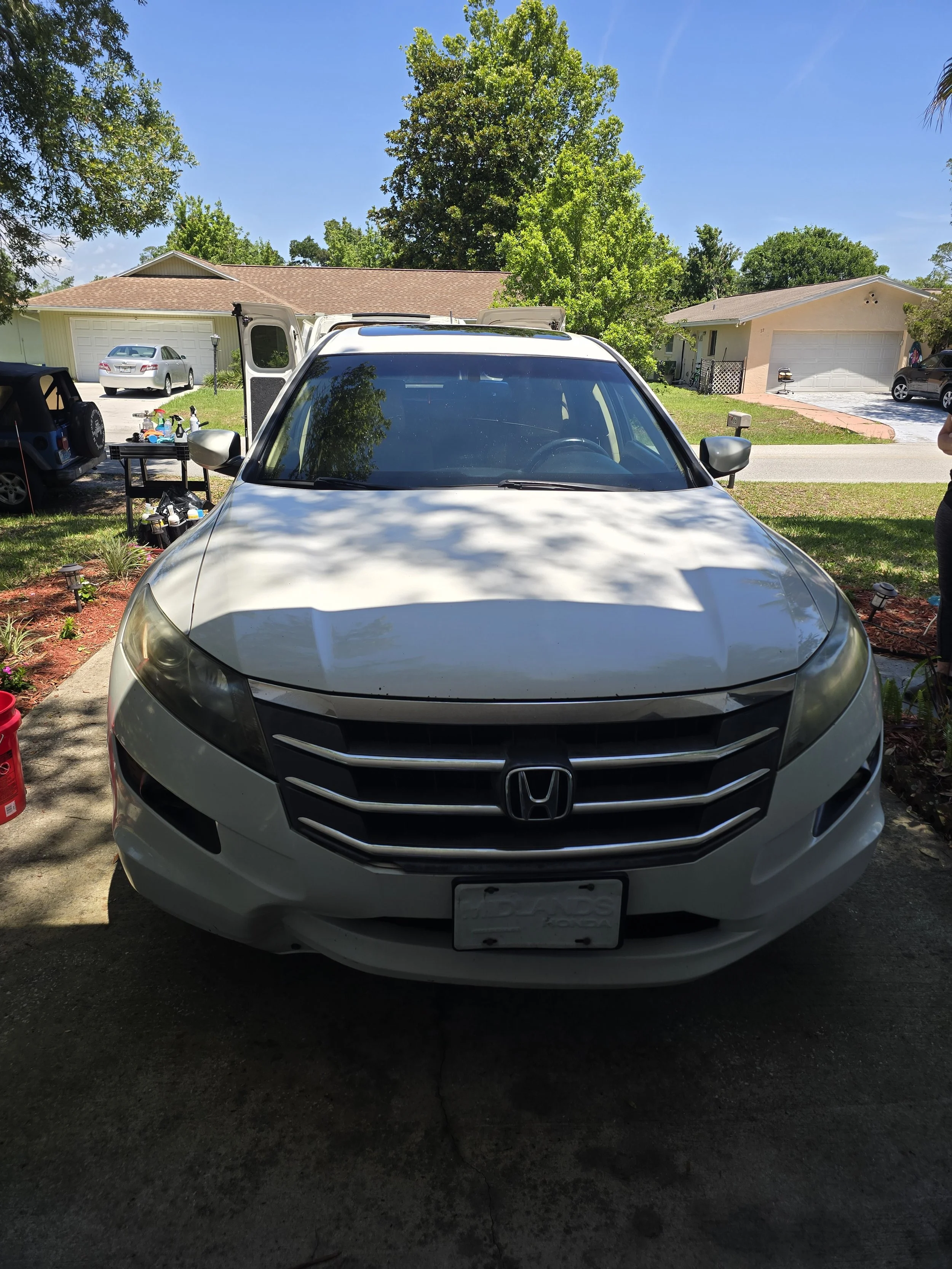 White Honda exterior car detailing service at a Palm Coast home by R.K. Mobile Detailing
