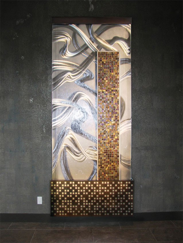 "Random Order" water wall. Stainless steel with random grind, irid glass, patinated laser cut steel. 48"w x 113"h x 8"d