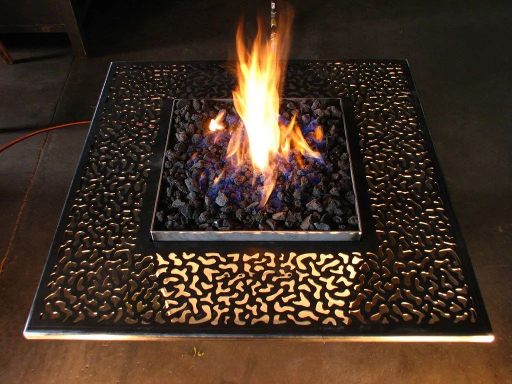 "Amoeba" fire table. Steel with temperature resistant coating (shown pre-coating) 48" square x 24"h. Natural gas fueled fire table