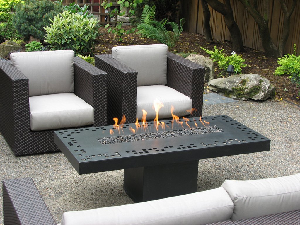 "Contemporary" fire table. Laser cut steel with high temp finish. 29" x 60" x 20"h. Natural gas fueled Fire table