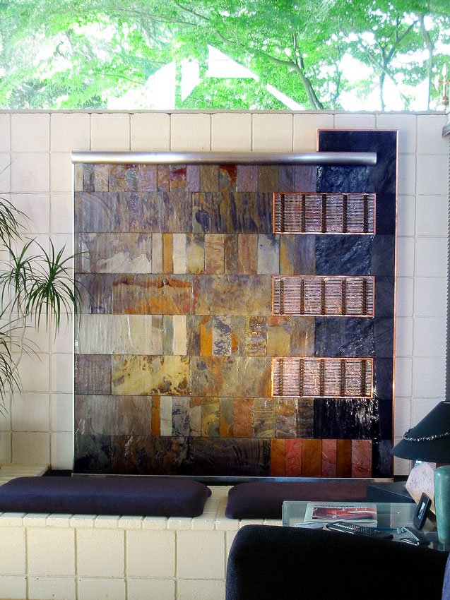 "Natural Tech" water wall. Stone, copper and stainless wire open weave panels. 5'w x 6'h