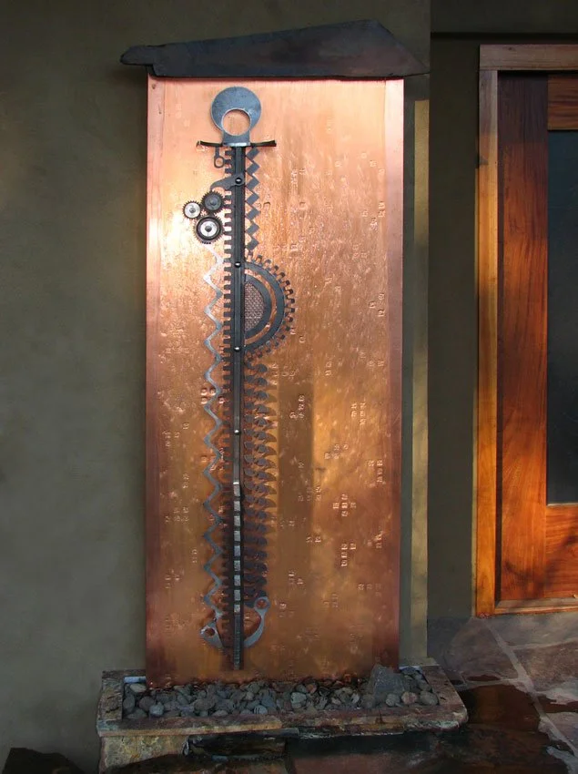 "Totem" water wall. Micro-hammered copper, natural stone,"Unity" sculptural element from reclaimed steel. 33"w x 91"h x 4"d