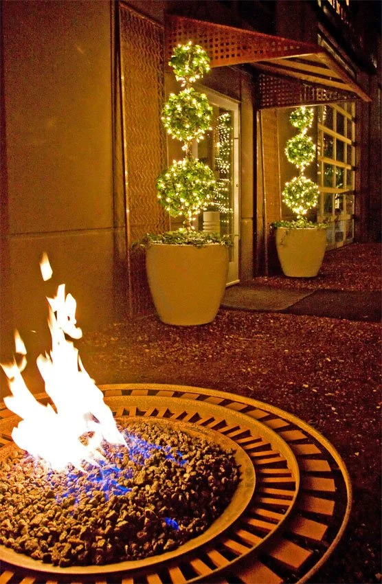 "Aztec fire pit". Made from mostly reclaimed laser cut, hardened steel and a high carbon farm implement disc. Also has a domed cover for the pit area (not shown). Wood fuled