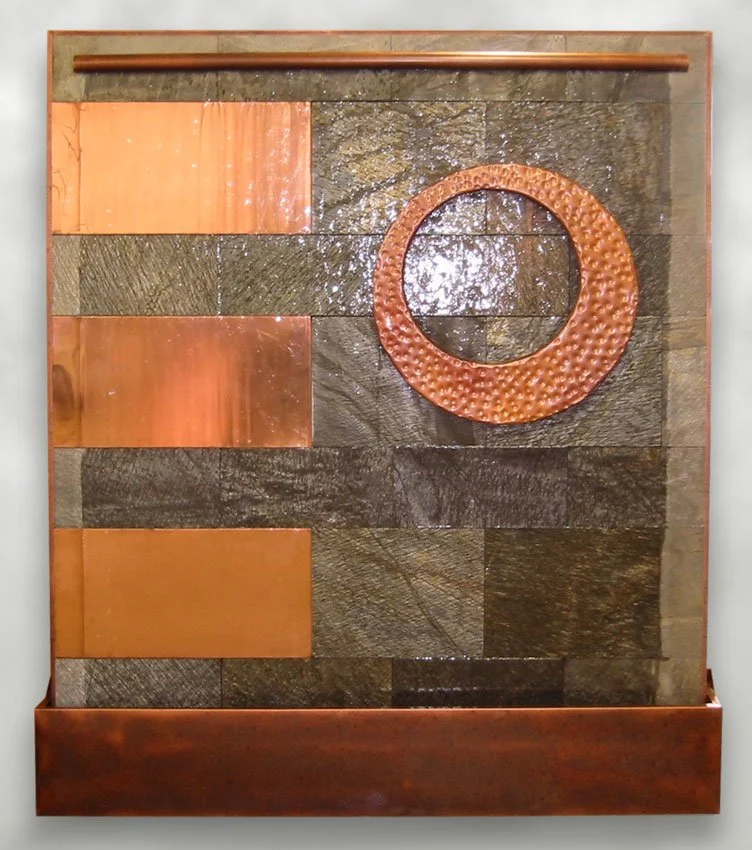 Stone and copper water wall. 5'w x 6'h