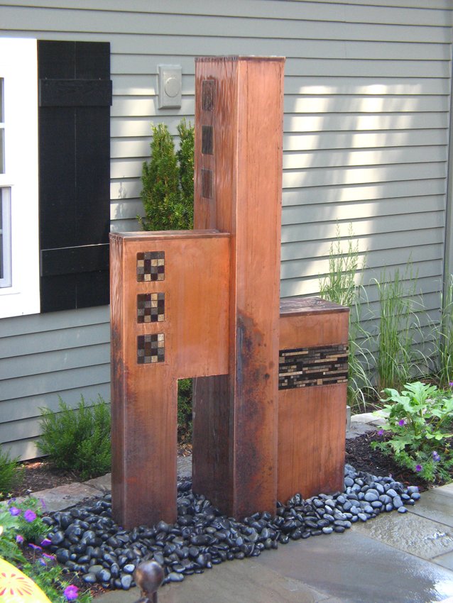 "Tricubic" water feature. Copper with patina, stone & irid glass tiles. 66" tall 