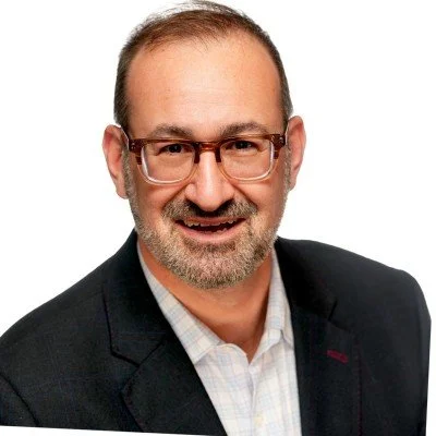 A portrait of Adam Wollowick