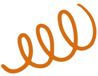 Close-up of a brown bear holding a piece of fish in its paws, standing near a body of water.