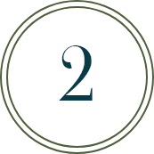 A black circular sign with a thin green border and the number 2 in blue in the center