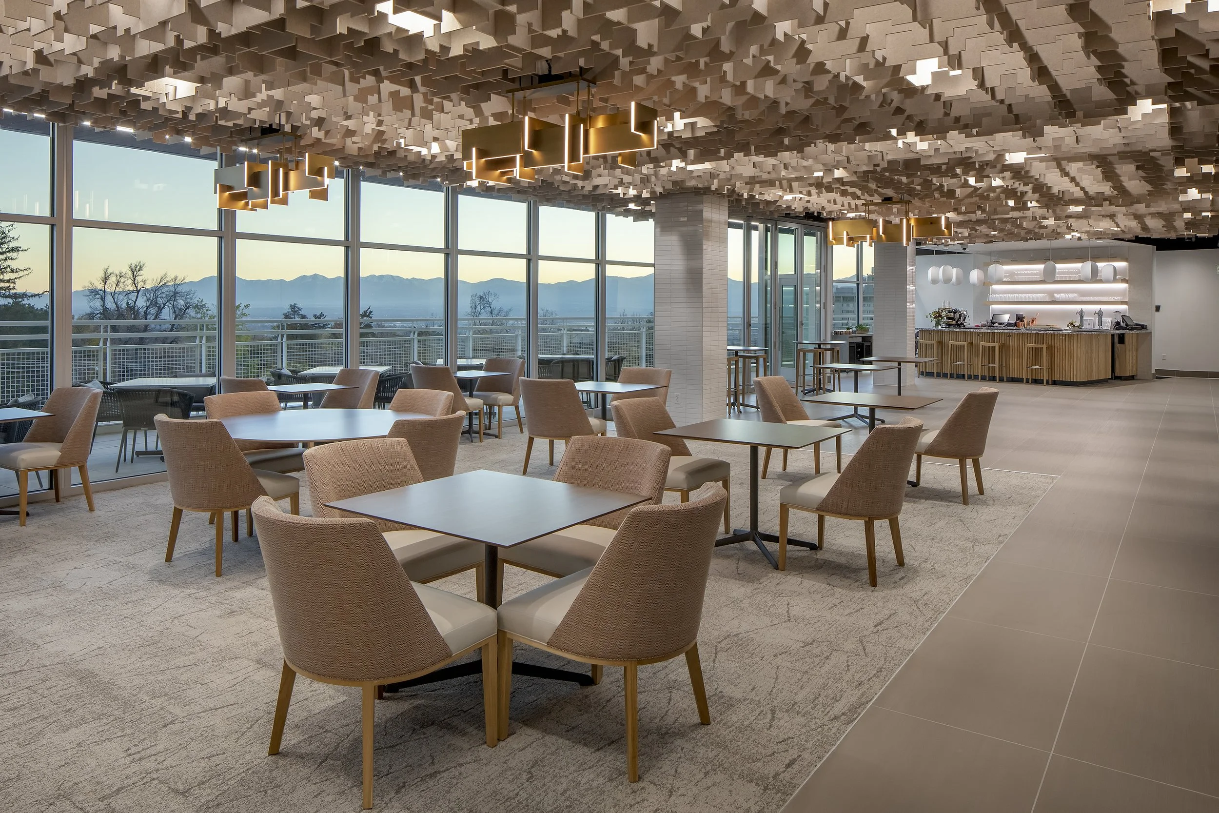 Rice-Eccles Stadium premium club lounge with mountain views — sports venue hospitality engineering by Lynk Engineers, Utah