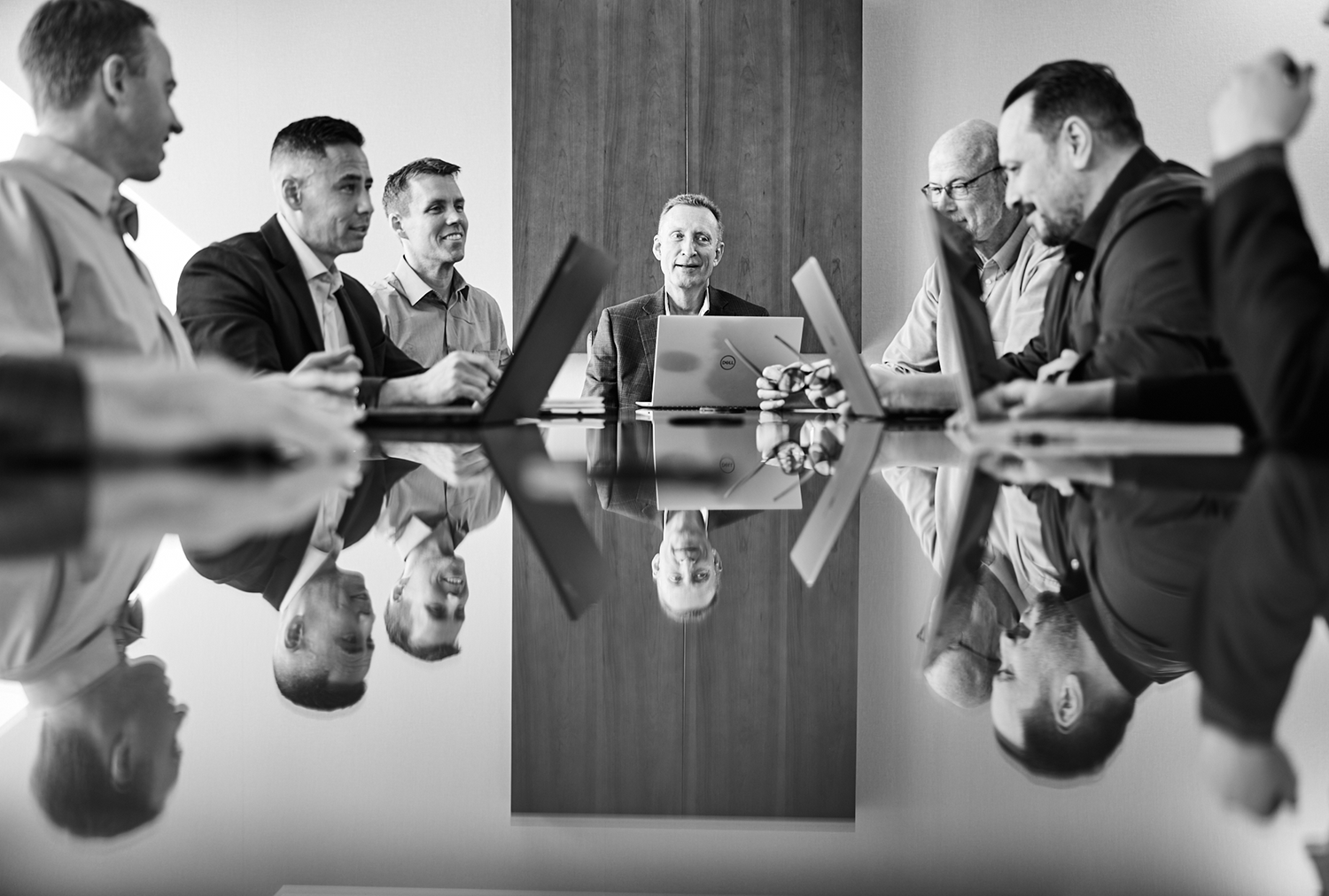 Lynk Engineers leadership team collaborating — award-winning MEPT engineering firm serving Utah, Idaho, and Maryland