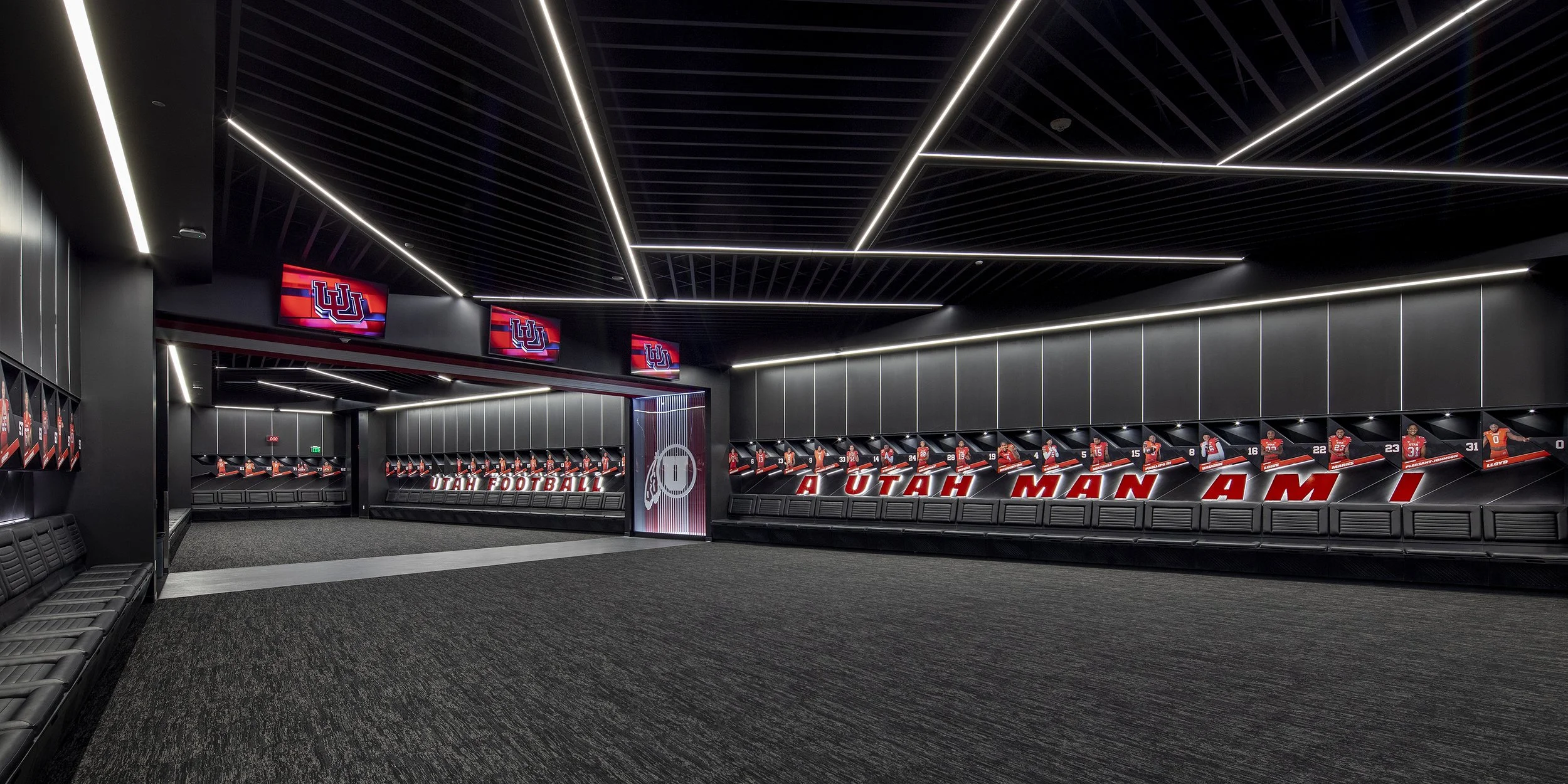Rice-Eccles Stadium locker room with LED lighting design — University of Utah sports venue electrical engineering by Lynk Engineers
