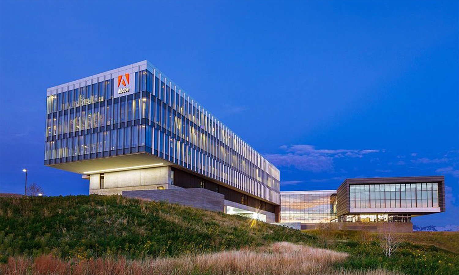 Adobe Lehi Campus exterior at dusk — commercial electrical engineering by Lynk Engineers, Lehi Utah