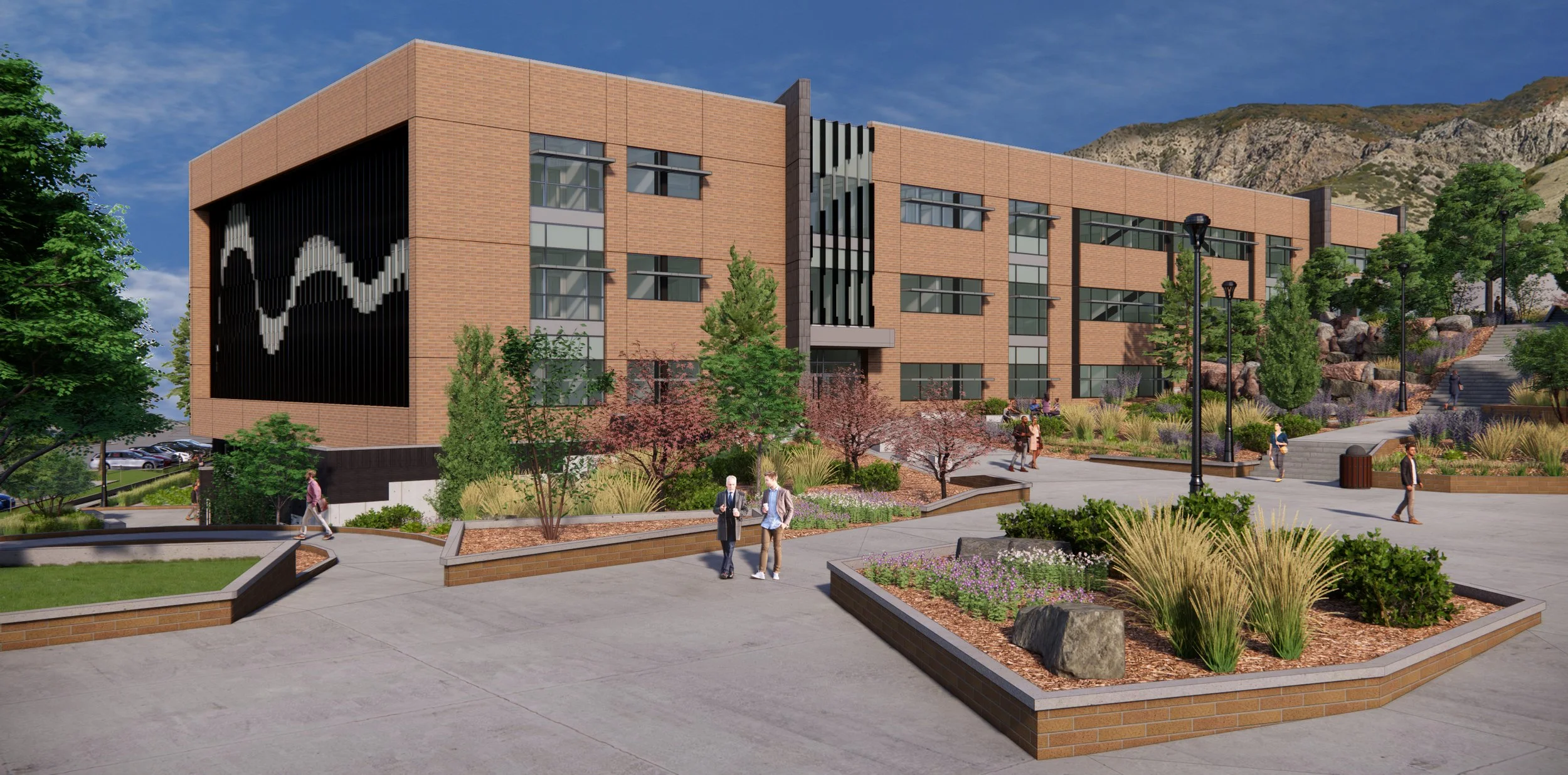 Modern brick building with large windows, surrounded by landscaped garden beds with plants and trees, and people walking on paved paths.