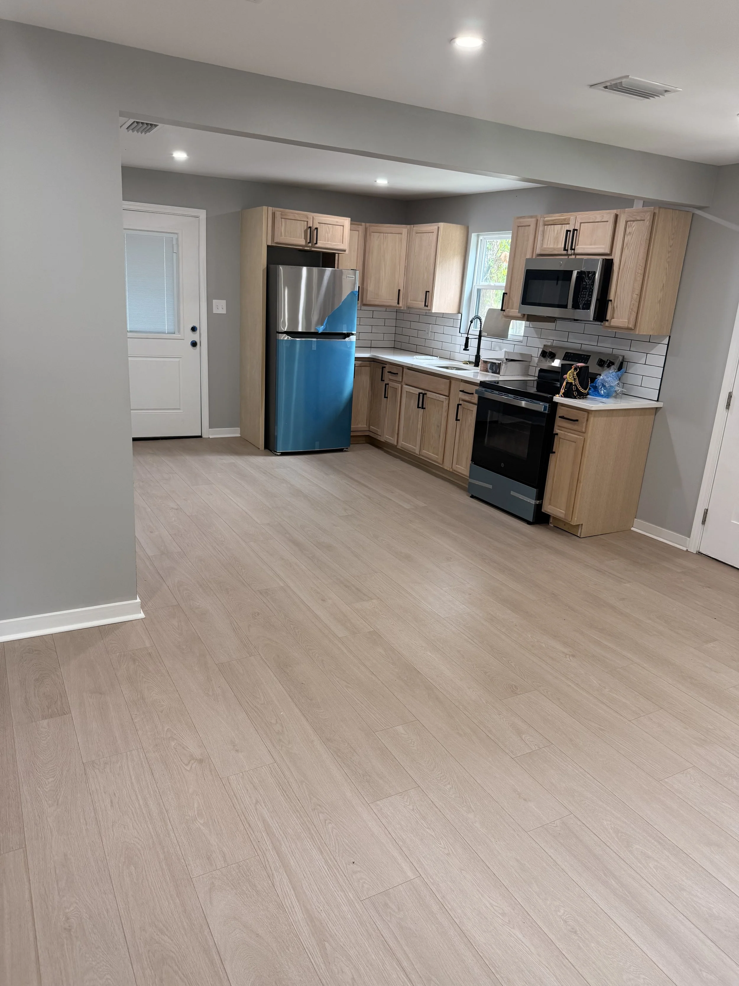 Modern open living space designed with peace in mind. Airy and calm, lighter woods were chosen to expand the space.