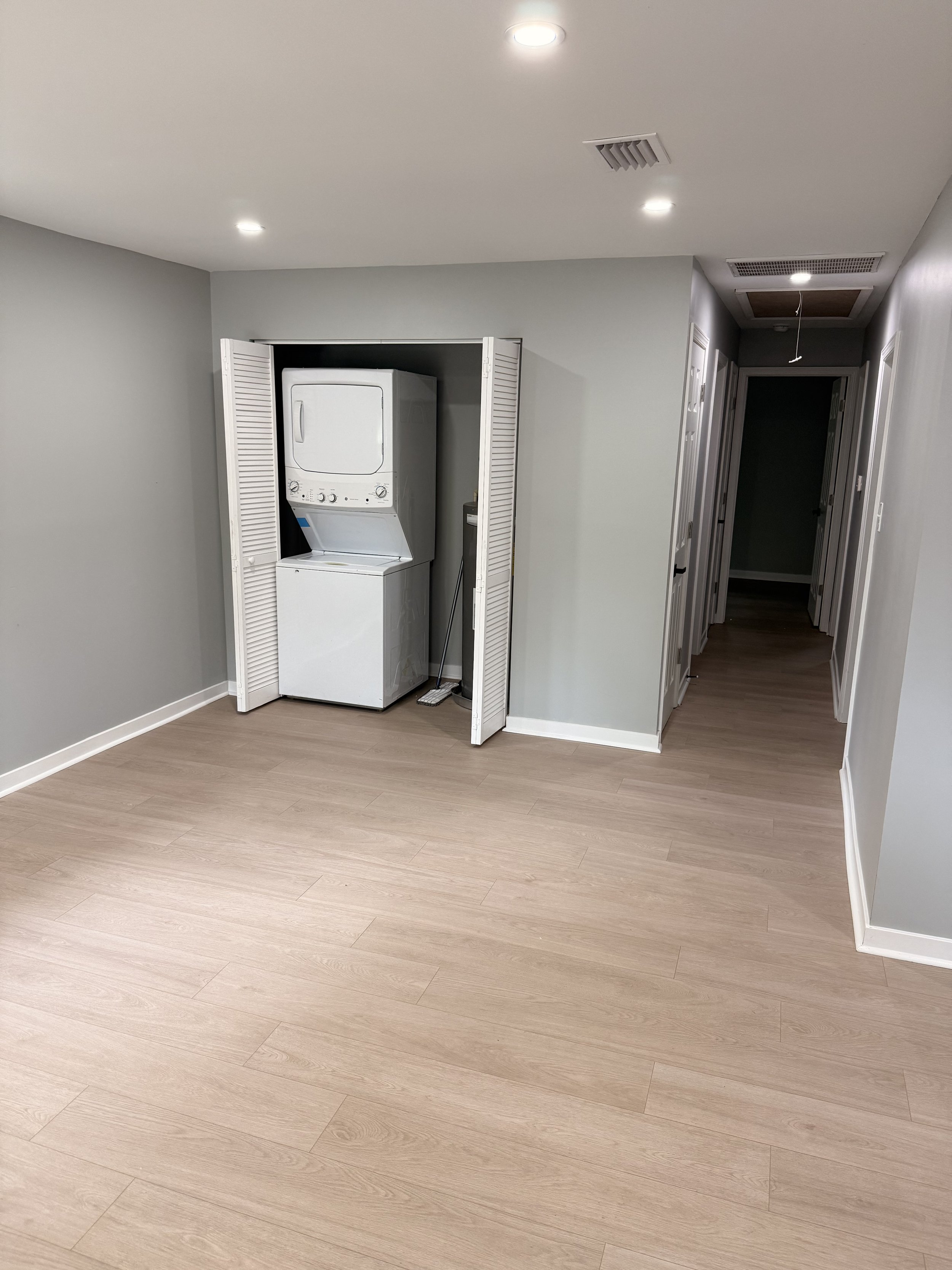 Recessed lighting and cool woods create an inviting peaceful space. 