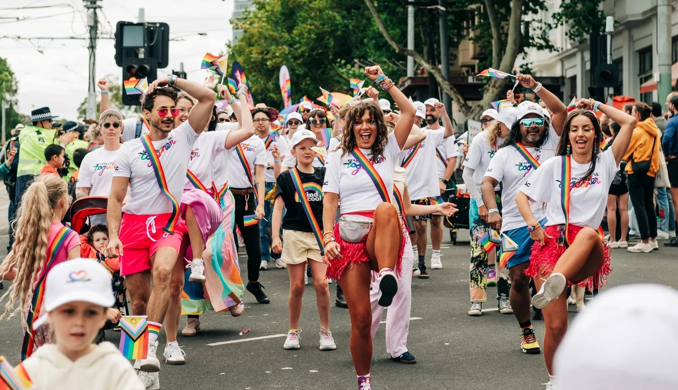 Lucy leading and performing with staff from TAC for their Midsumma Pride march.