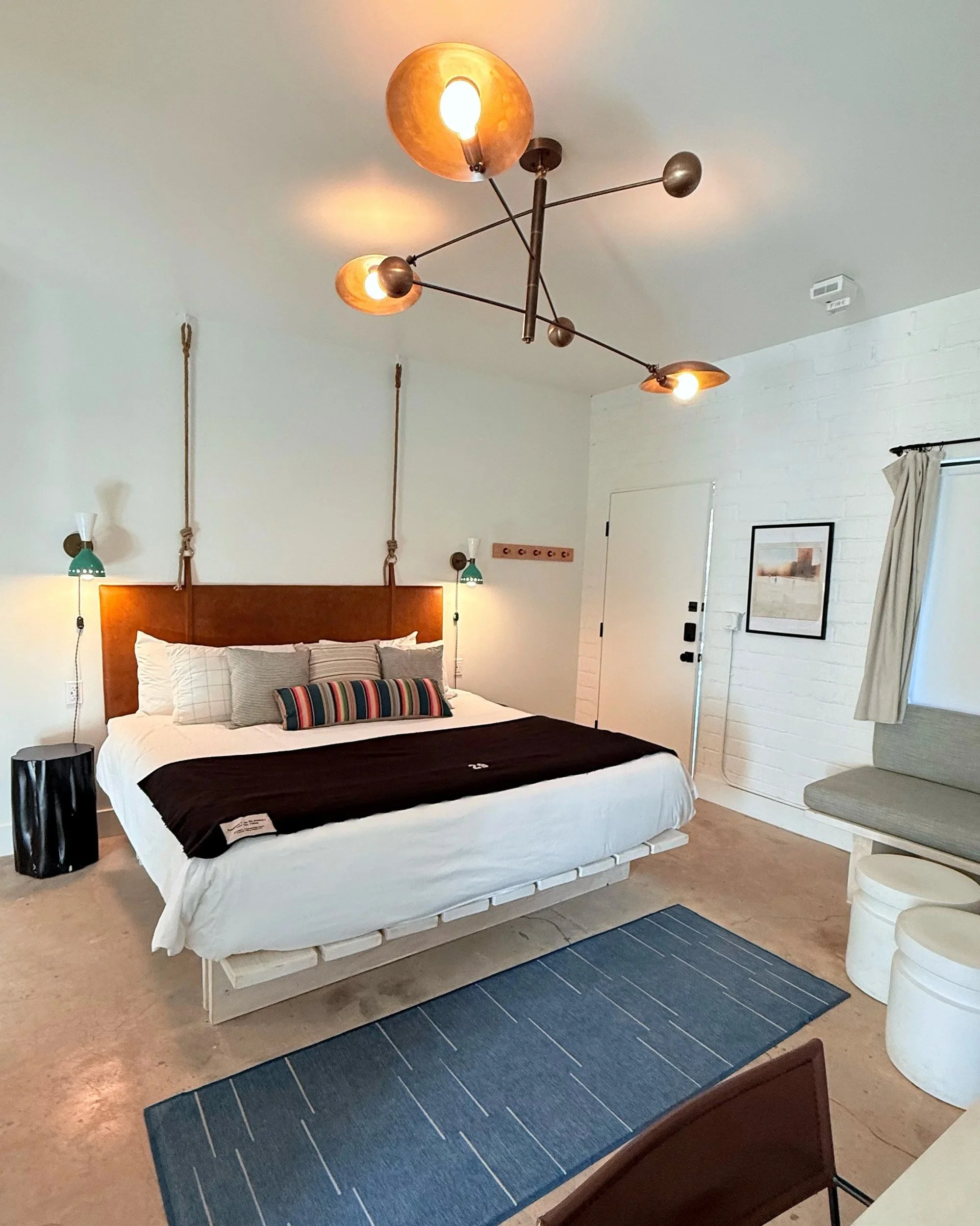 Mid-century styled room at Ramsey 29 boutique hotel