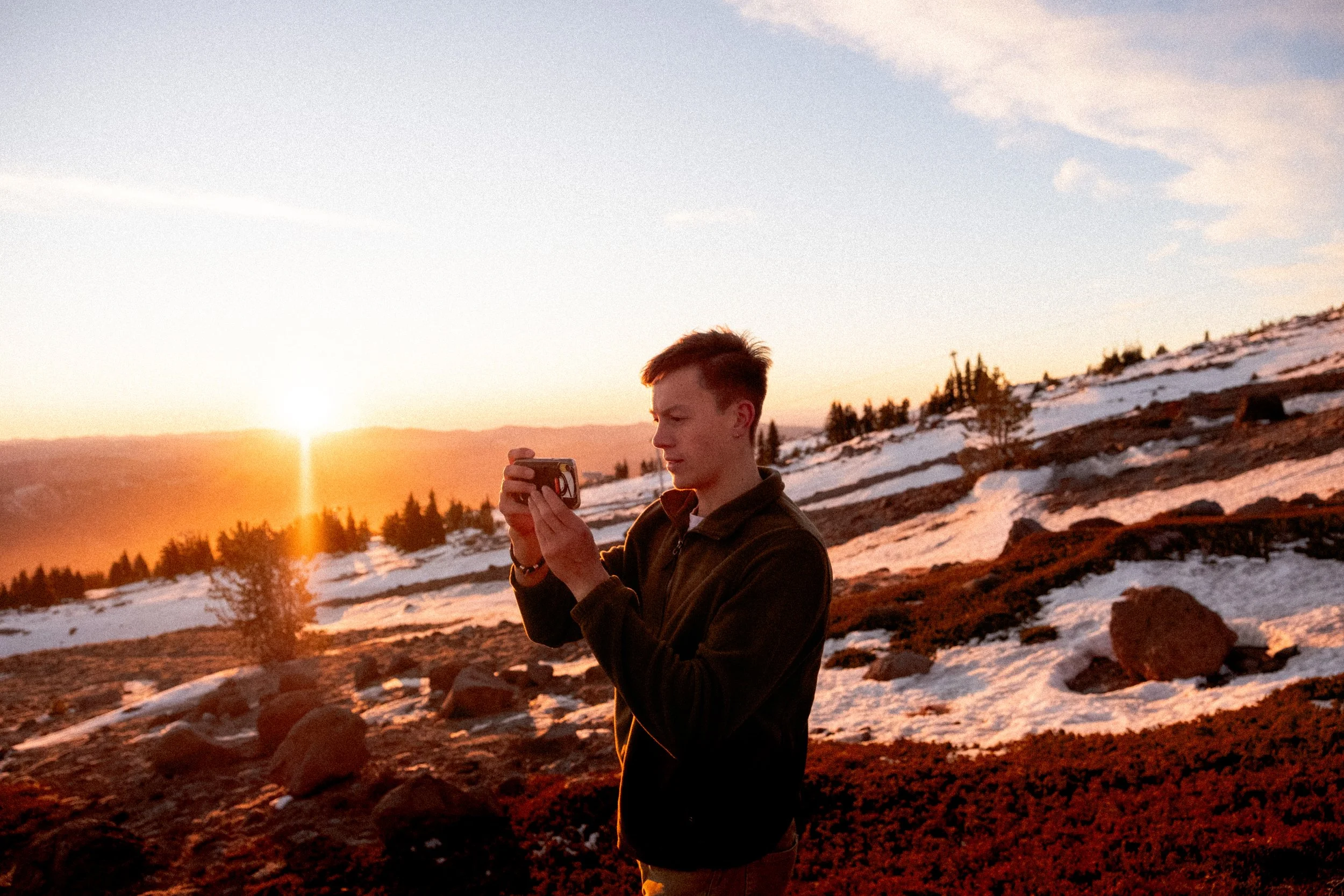 AJ Miranda Photography Vibrant PNW Alpine Photography capturing the snow-covered summit of Mt. Hood, Oregon, in October 2023, showcasing dramatic red and orange lighting.