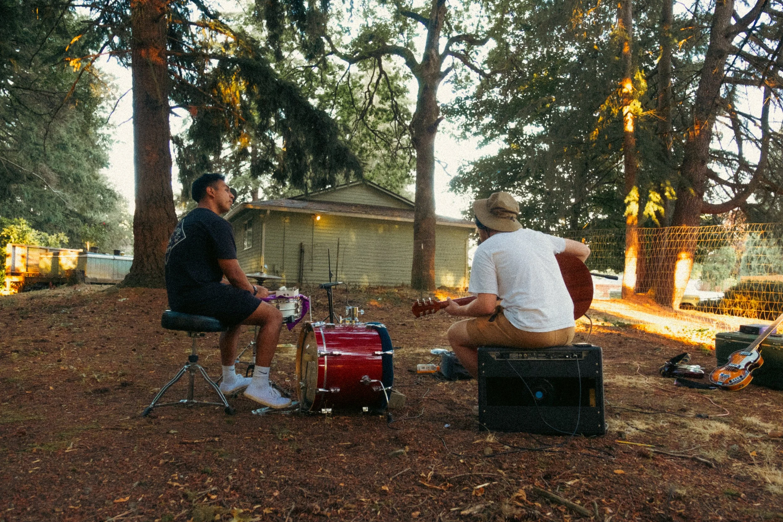 AJ Miranda Photography Candid, unpolished band photography from the Raw Reality series of EL Wedos, capturing genuine chaos using high-contrast dark flash in Vancouver, WA's deep PNW winter greens.