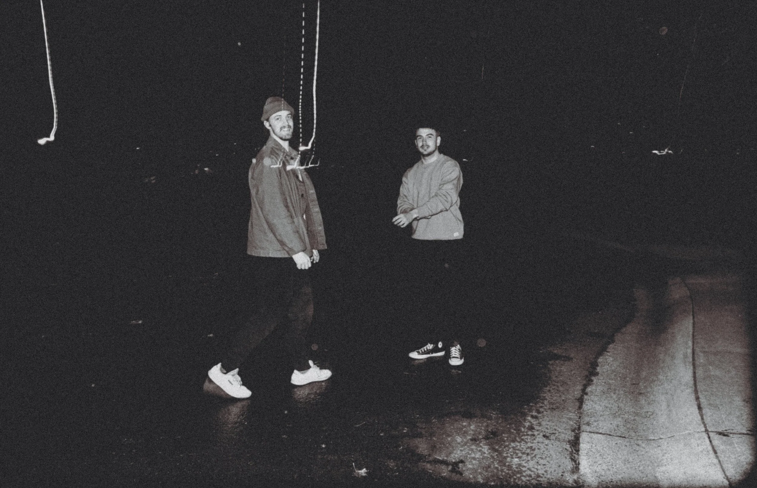 AJ Miranda Photography Candid, unpolished band photography from the Raw Reality series of EL Wedos, capturing genuine chaos using high-contrast dark flash in Vancouver, WA's deep PNW winter greens.