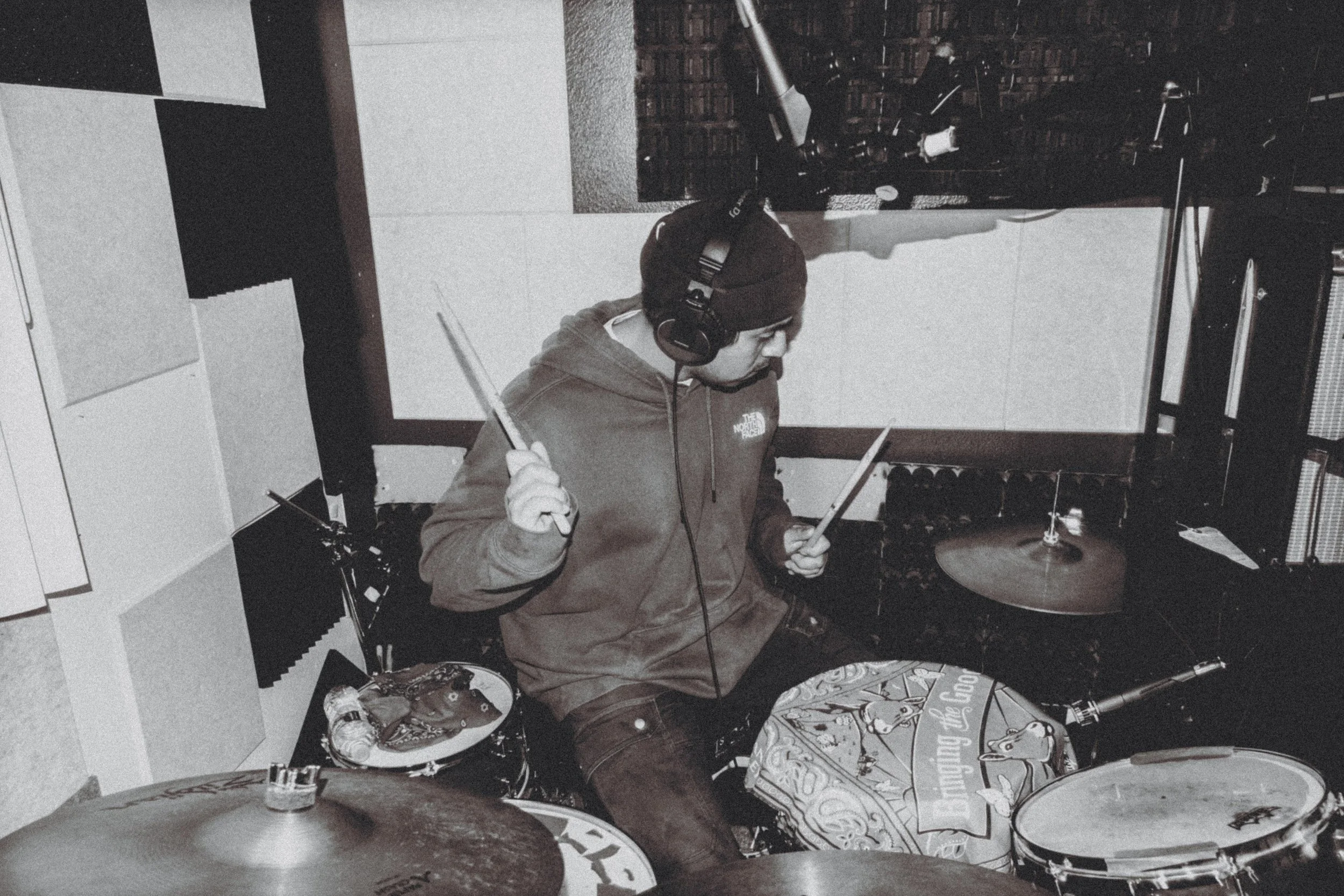 AJ Miranda Photography Candid, unpolished band photography from the Raw Reality series of EL Wedos, capturing genuine chaos using high-contrast dark flash in Vancouver, WA's deep PNW winter greens.