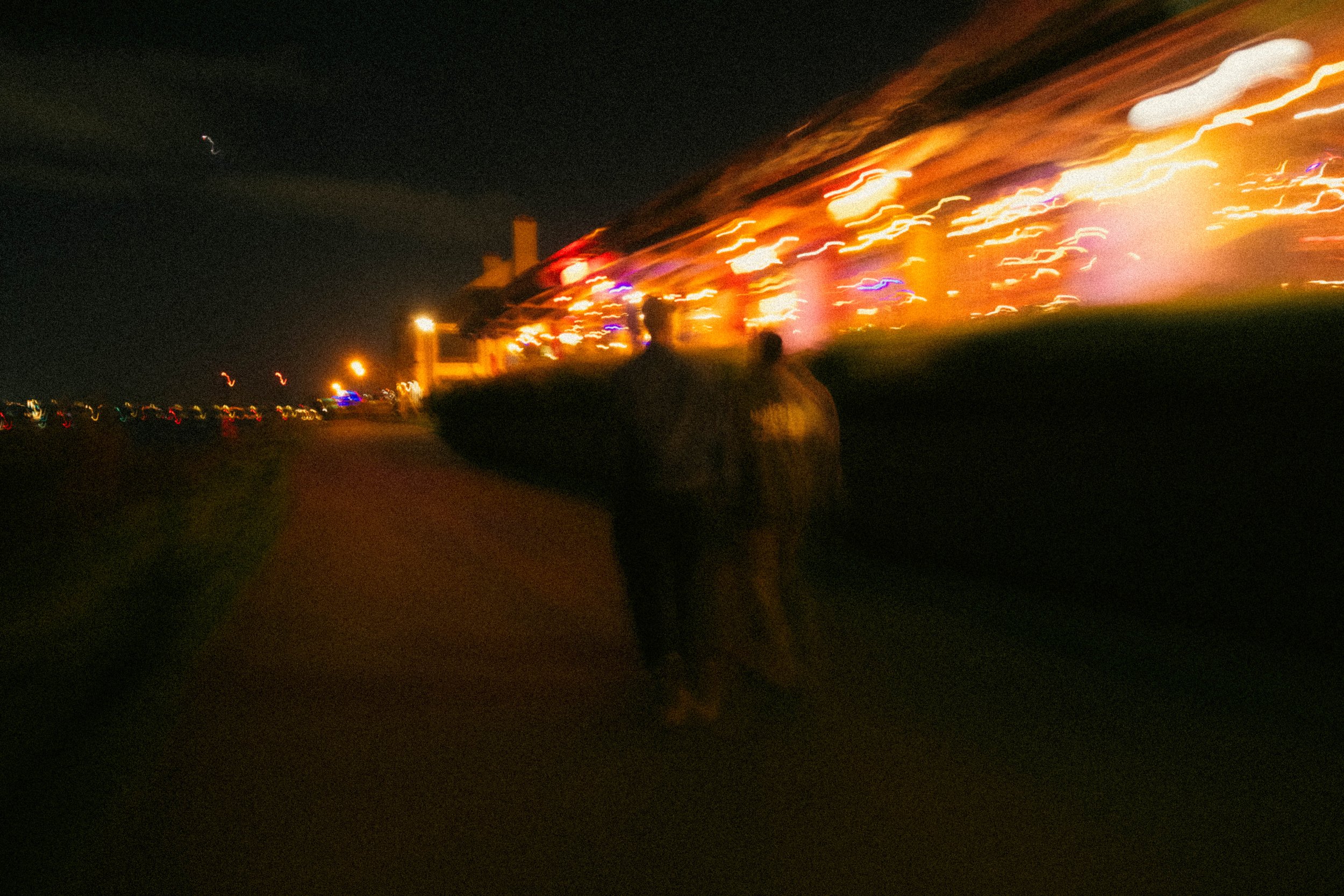 High-contrast candid flash photography of the EL Wedos band in Vancouver, WA. Unpolished style capturing authentic, unfiltered reality and personality against the dark, blooming PNW nature.