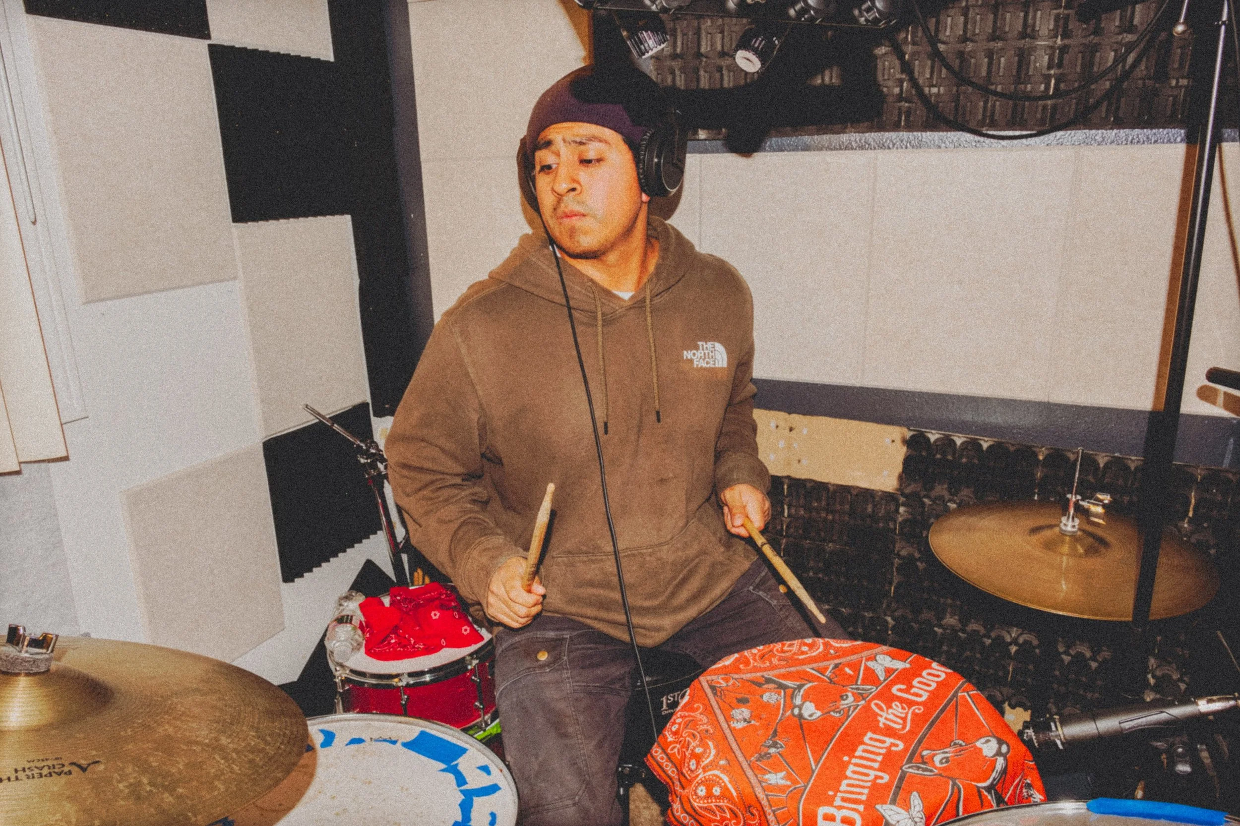 AJ Miranda Photography Candid, unpolished band photography from the Raw Reality series of EL Wedos, capturing genuine chaos using high-contrast dark flash in Vancouver, WA's deep PNW winter greens.