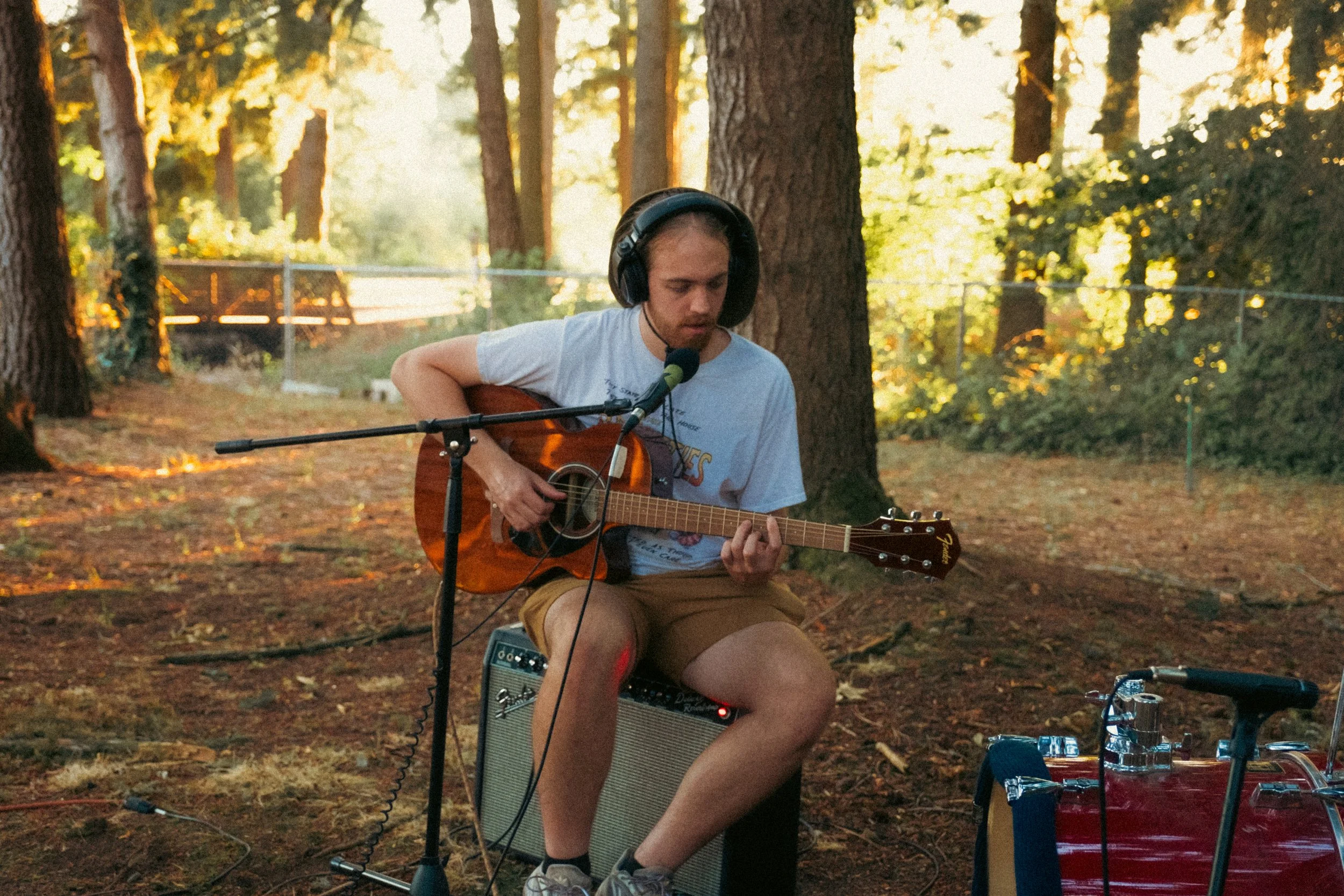 Unpolished band portrait from the Raw Reality series of EL Wedos, emphasizing the high-contrast flash lighting against the deep, irresistible PNW winter and spring greens in Vancouver, WA.