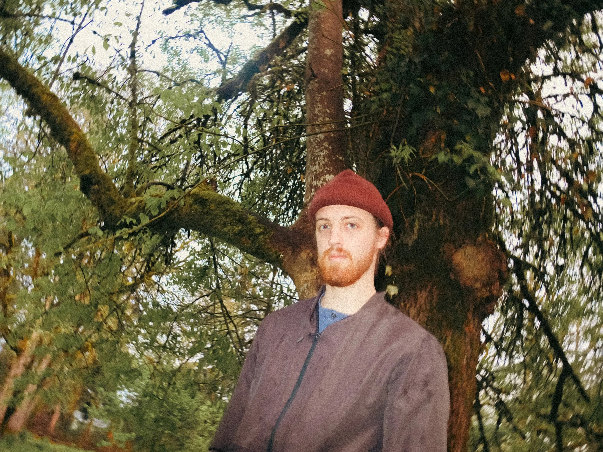 Unpolished band portrait from the Raw Reality series of EL Wedos, emphasizing the high-contrast flash lighting against the deep, irresistible PNW winter and spring greens in Vancouver, WA.