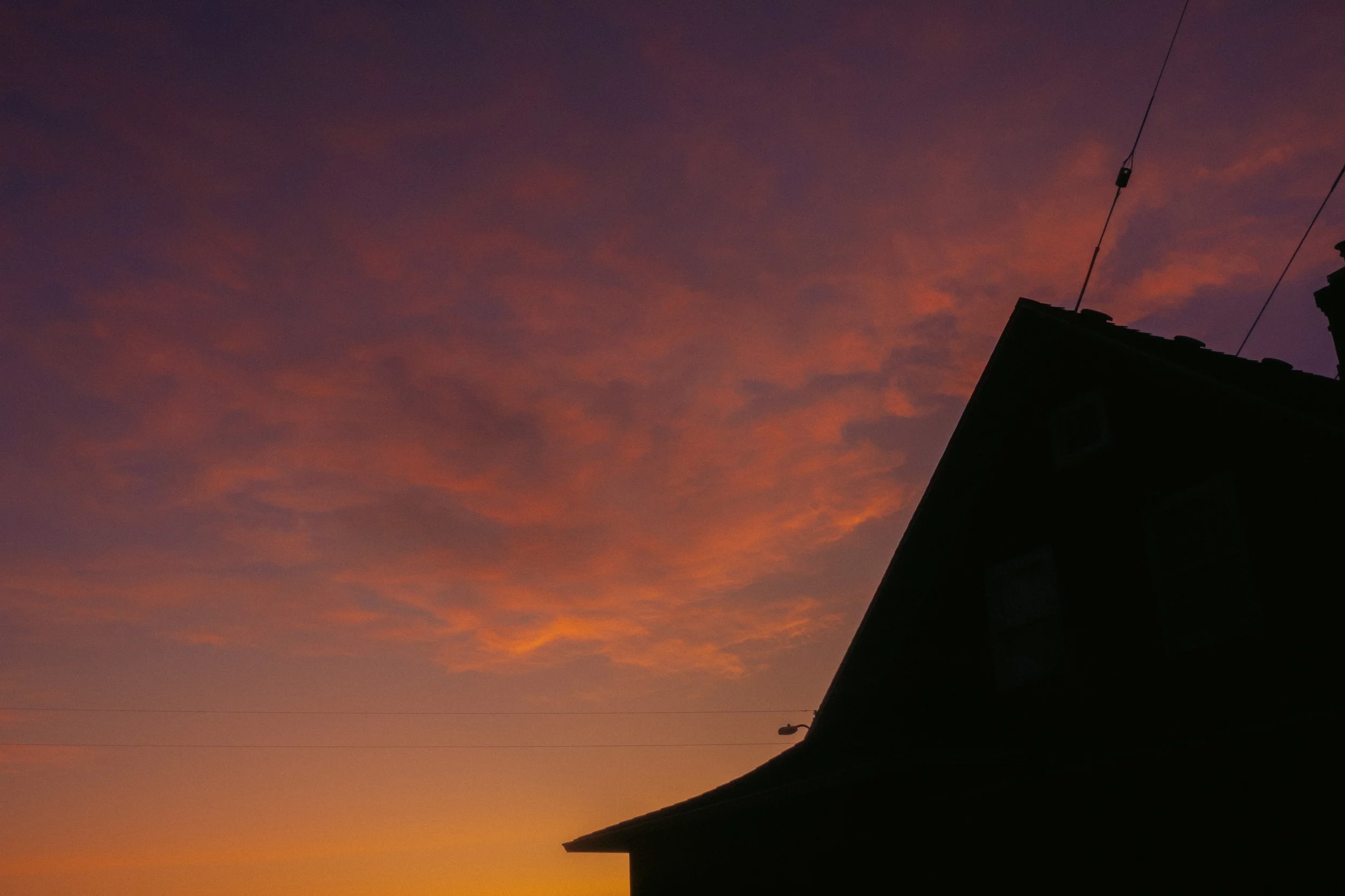 AJ Miranda Long-exposure, cinematic photographs documenting the intense 4th of July fireworks display and grand finale over Seaside, Oregon Coast in 2025. This dark and moody film series captures the chaotic, warzone-like atmosphere of the crowded be