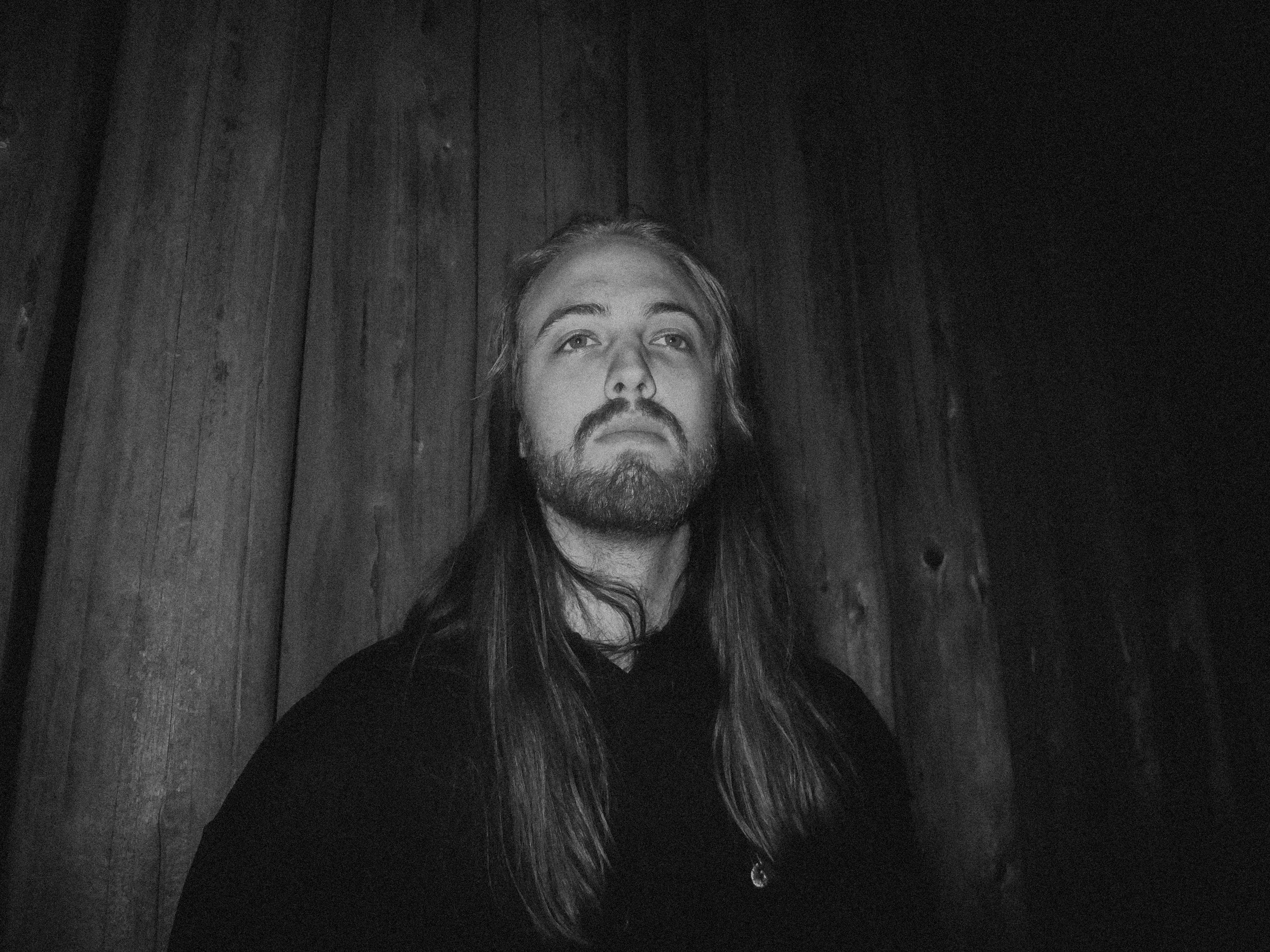 AJ Miranda Photography Candid, unpolished band photography from the Raw Reality series of EL Wedos, capturing genuine chaos using high-contrast dark flash in Vancouver, WA's deep PNW winter greens.