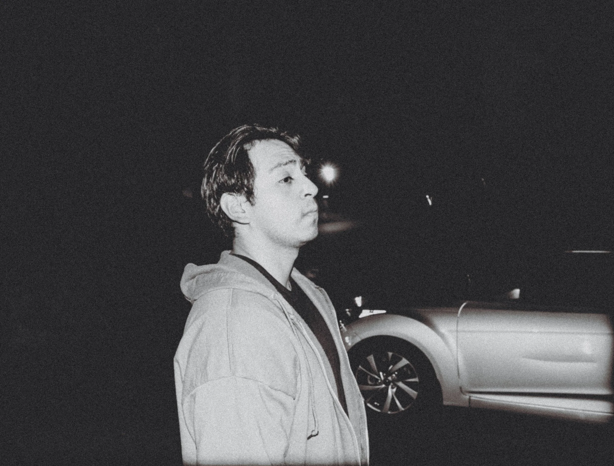 AJ Miranda Photography Candid, unpolished band photography from the Raw Reality series of EL Wedos, capturing genuine chaos using high-contrast dark flash in Vancouver, WA's deep PNW winter greens.