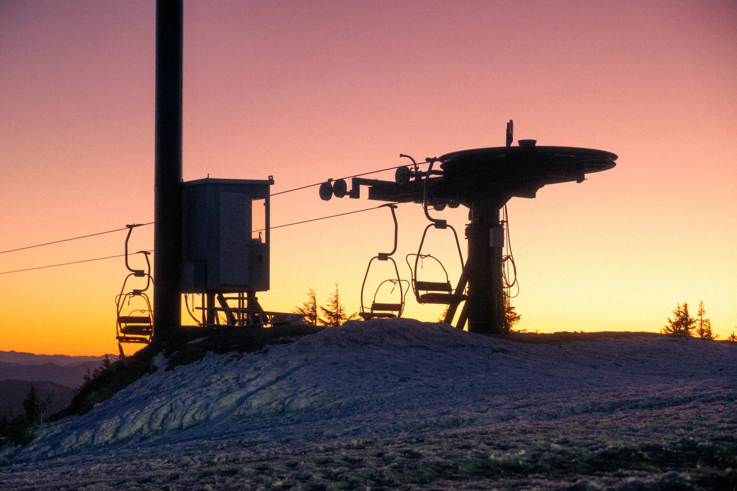 AJ Miranda Photography Vibrant PNW Alpine Photography capturing the snow-covered summit of Mt. Hood, Oregon, in October 2023, showcasing dramatic red and orange lighting.