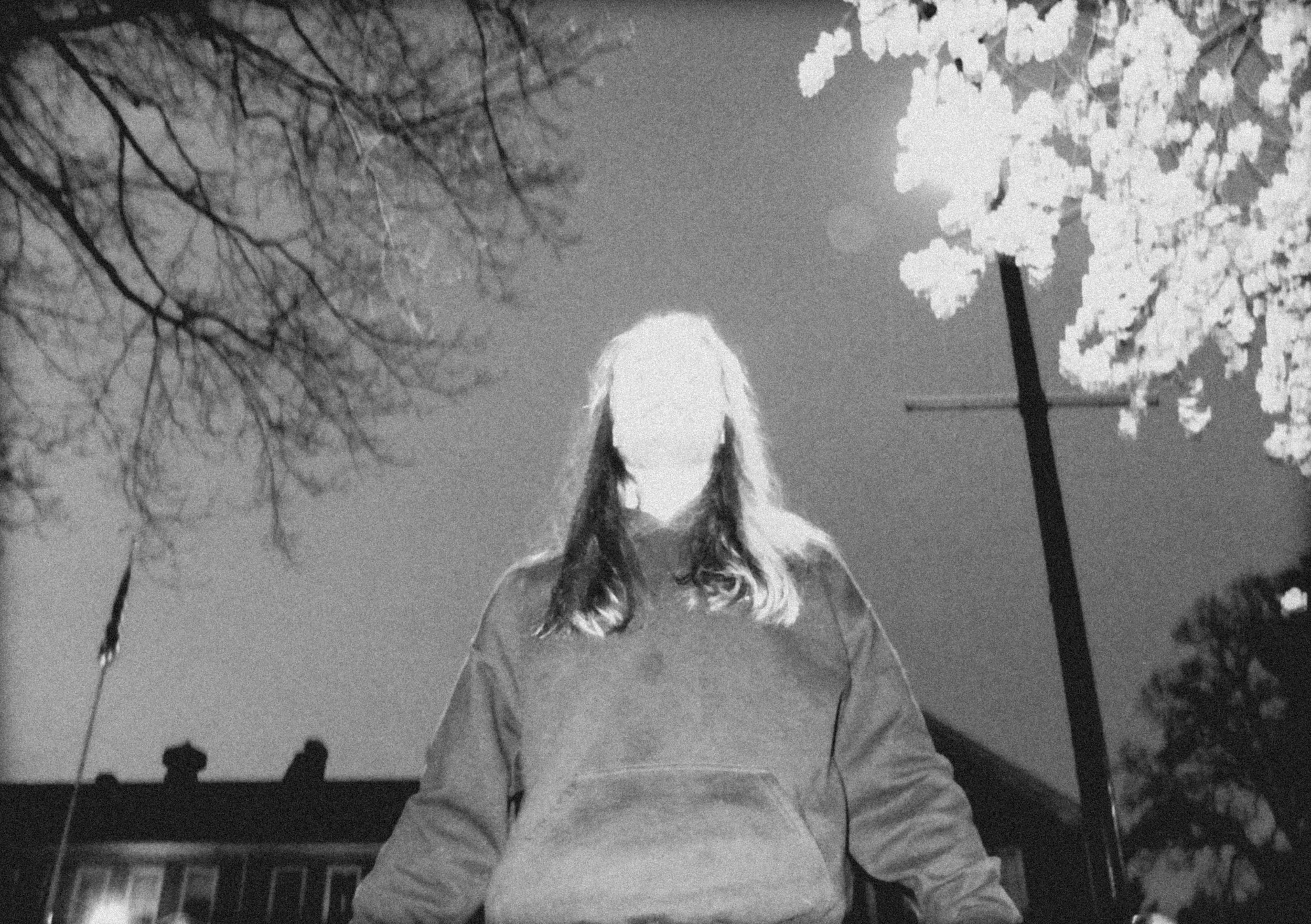 AJ Miranda Photography Candid, unpolished band photography from the Raw Reality series of EL Wedos, capturing genuine chaos using high-contrast dark flash in Vancouver, WA's deep PNW winter greens.