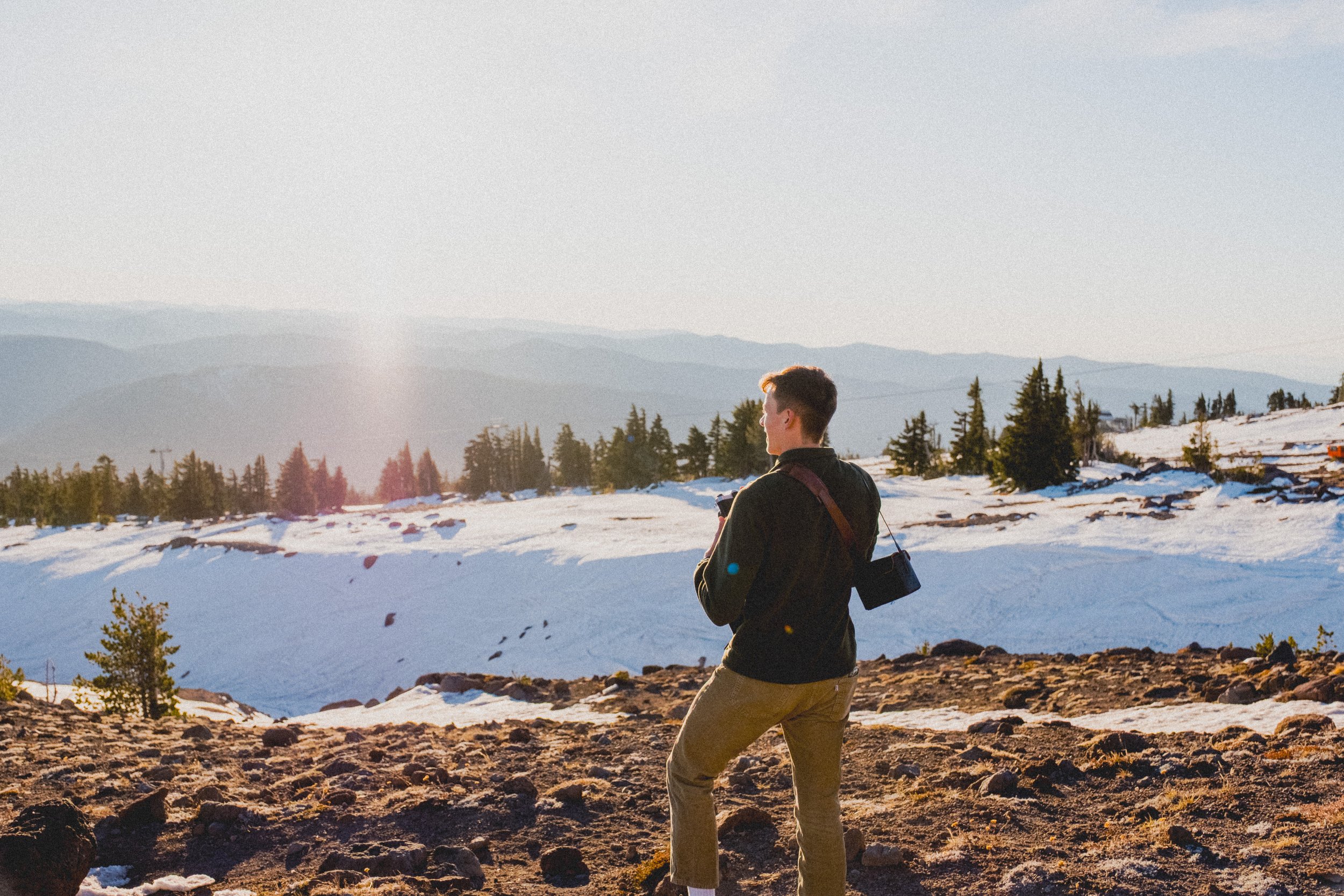 AJ Miranda Photography Vibrant PNW Alpine Photography capturing the snow-covered summit of Mt. Hood, Oregon, in October 2023, showcasing dramatic red and orange lighting.