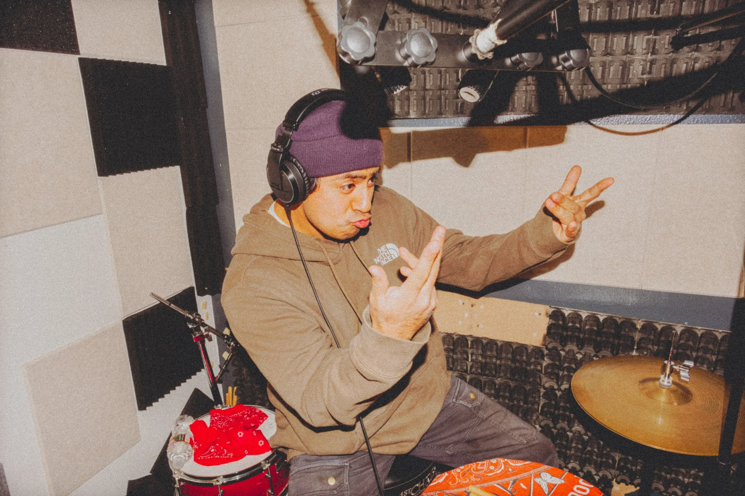 AJ Miranda Photography Candid, unpolished band photography from the Raw Reality series of EL Wedos, capturing genuine chaos using high-contrast dark flash in Vancouver, WA's deep PNW winter greens.