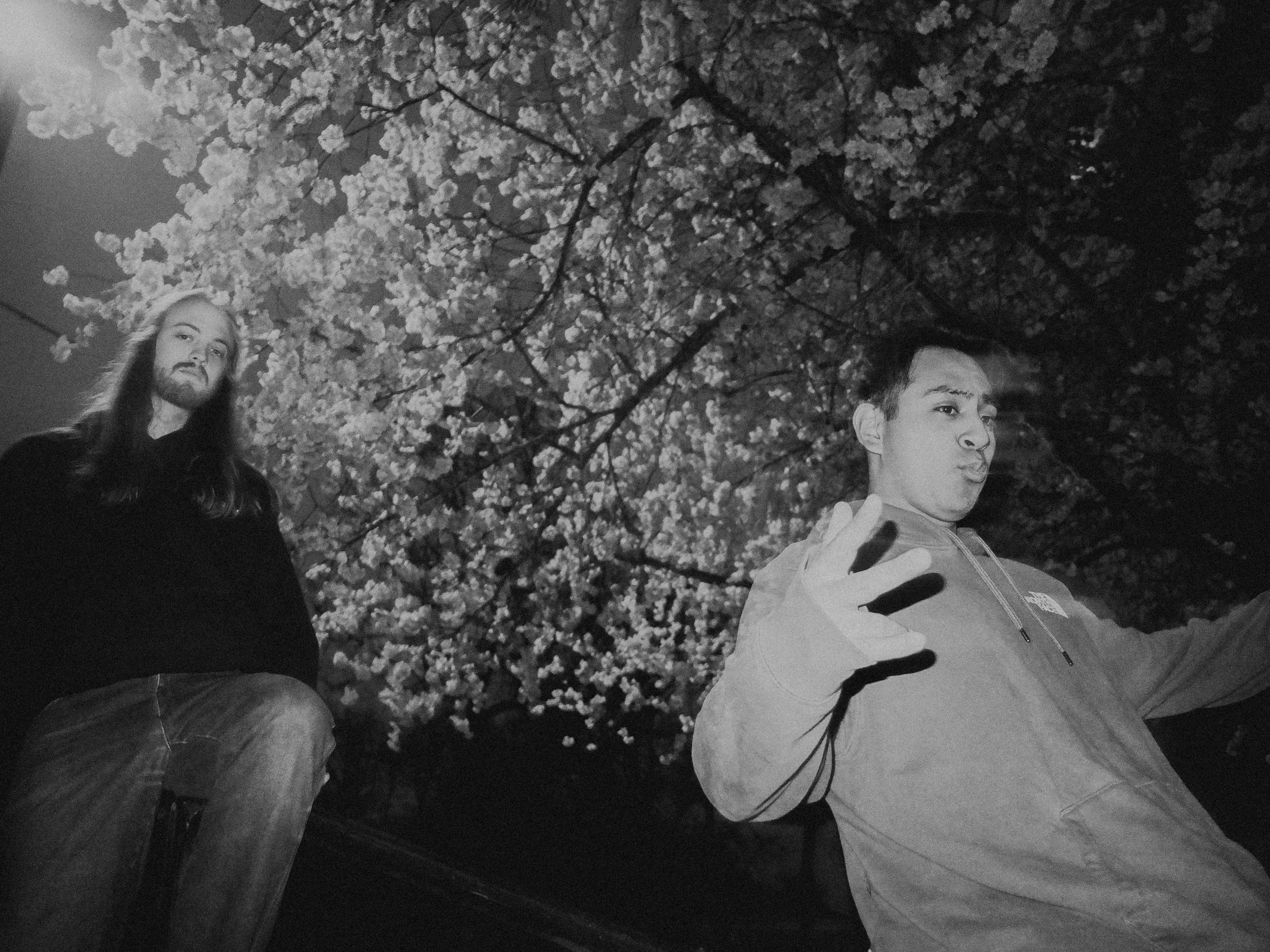 AJ Miranda Photography Candid, unpolished band photography from the Raw Reality series of EL Wedos, capturing genuine chaos using high-contrast dark flash in Vancouver, WA's deep PNW winter greens.