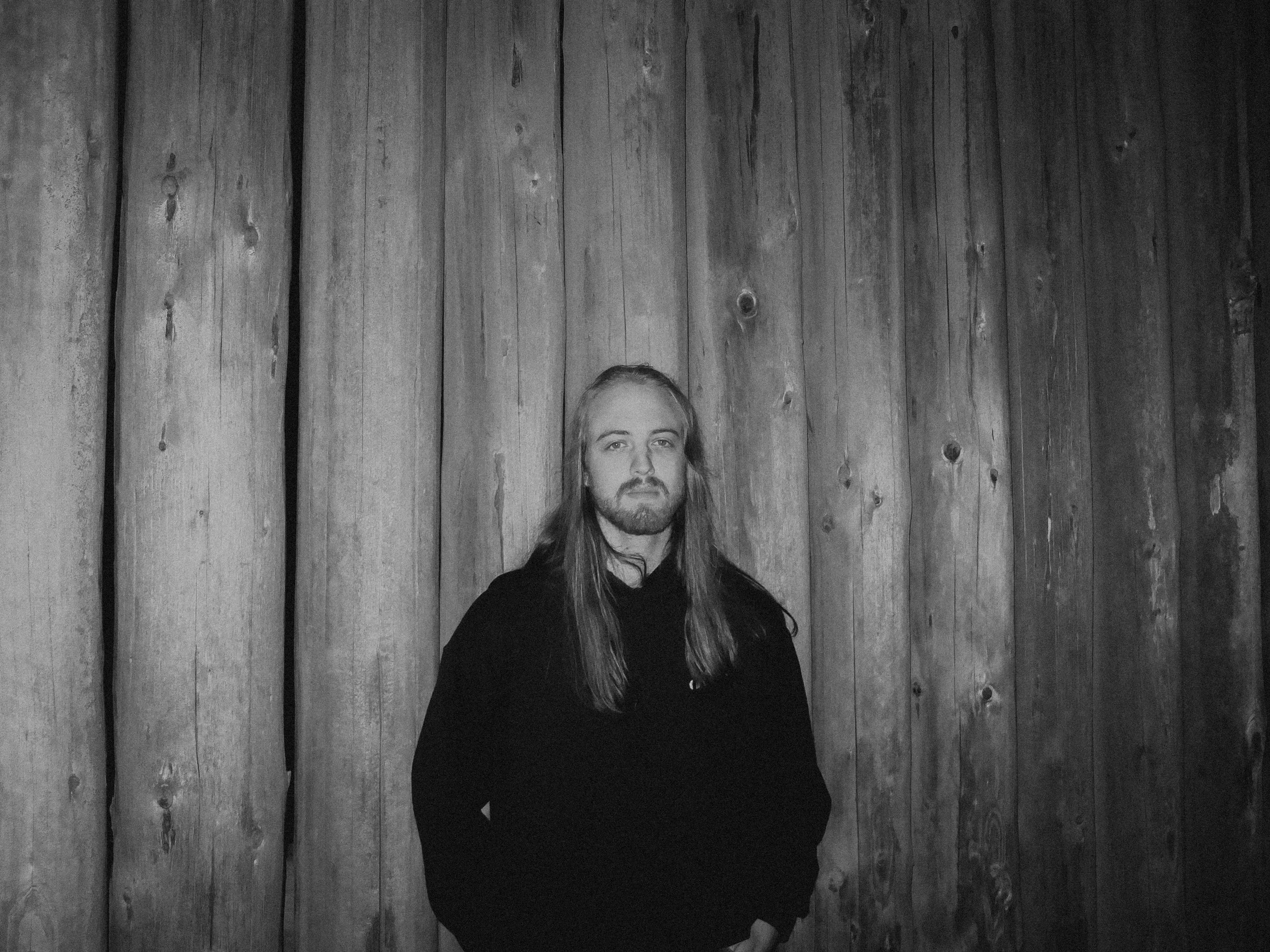 AJ Miranda Photography Candid, unpolished band photography from the Raw Reality series of EL Wedos, capturing genuine chaos using high-contrast dark flash in Vancouver, WA's deep PNW winter greens.