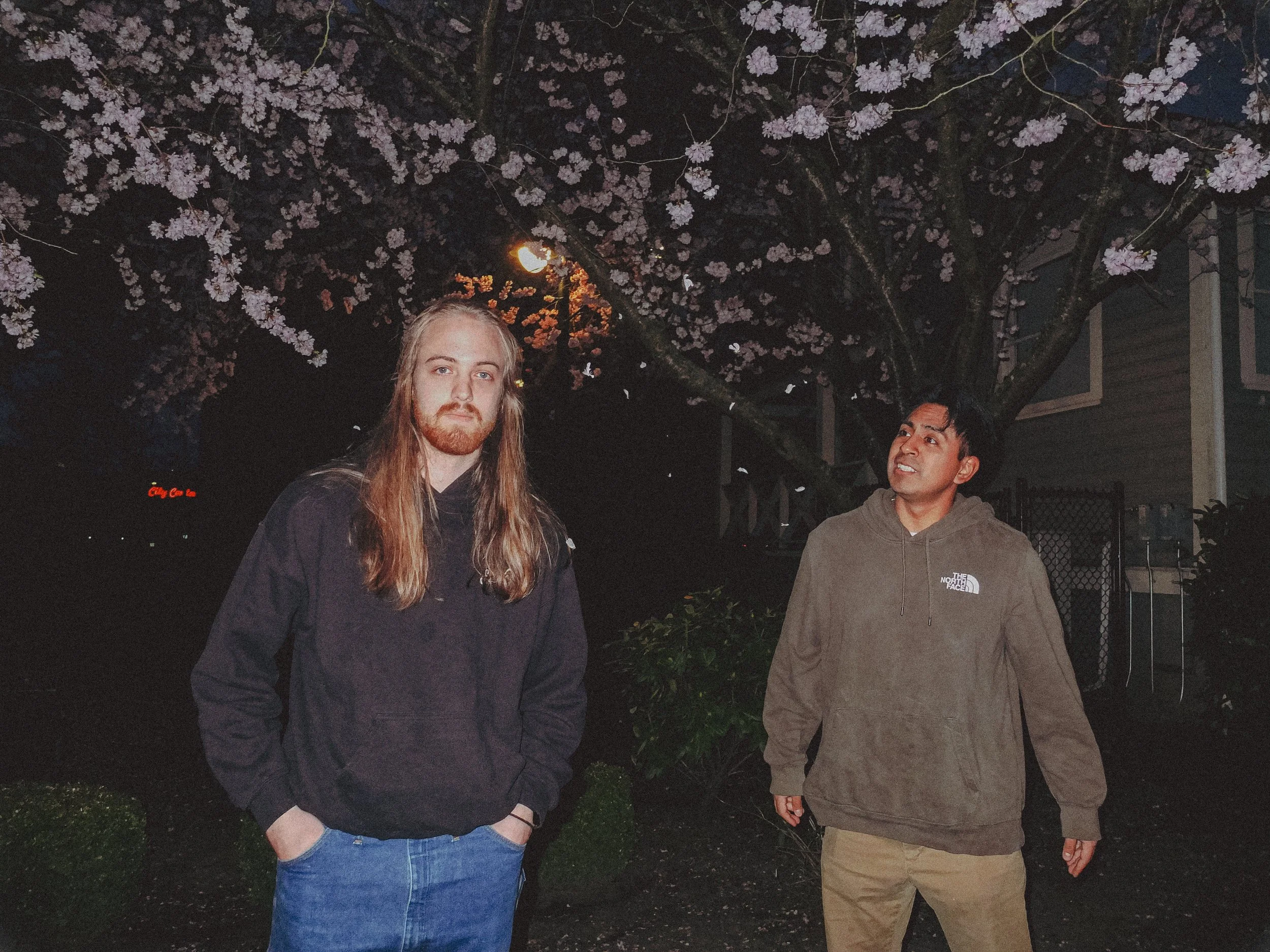 AJ Miranda Photography Candid, unpolished band photography from the Raw Reality series of EL Wedos, capturing genuine chaos using high-contrast dark flash in Vancouver, WA's deep PNW winter greens.