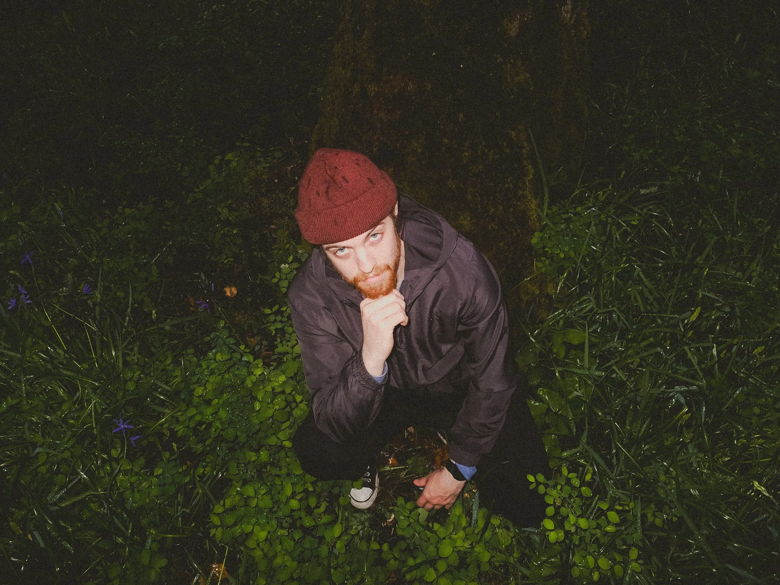 Unpolished band portrait from the Raw Reality series of EL Wedos, emphasizing the high-contrast flash lighting against the deep, irresistible PNW winter and spring greens in Vancouver, WA.
