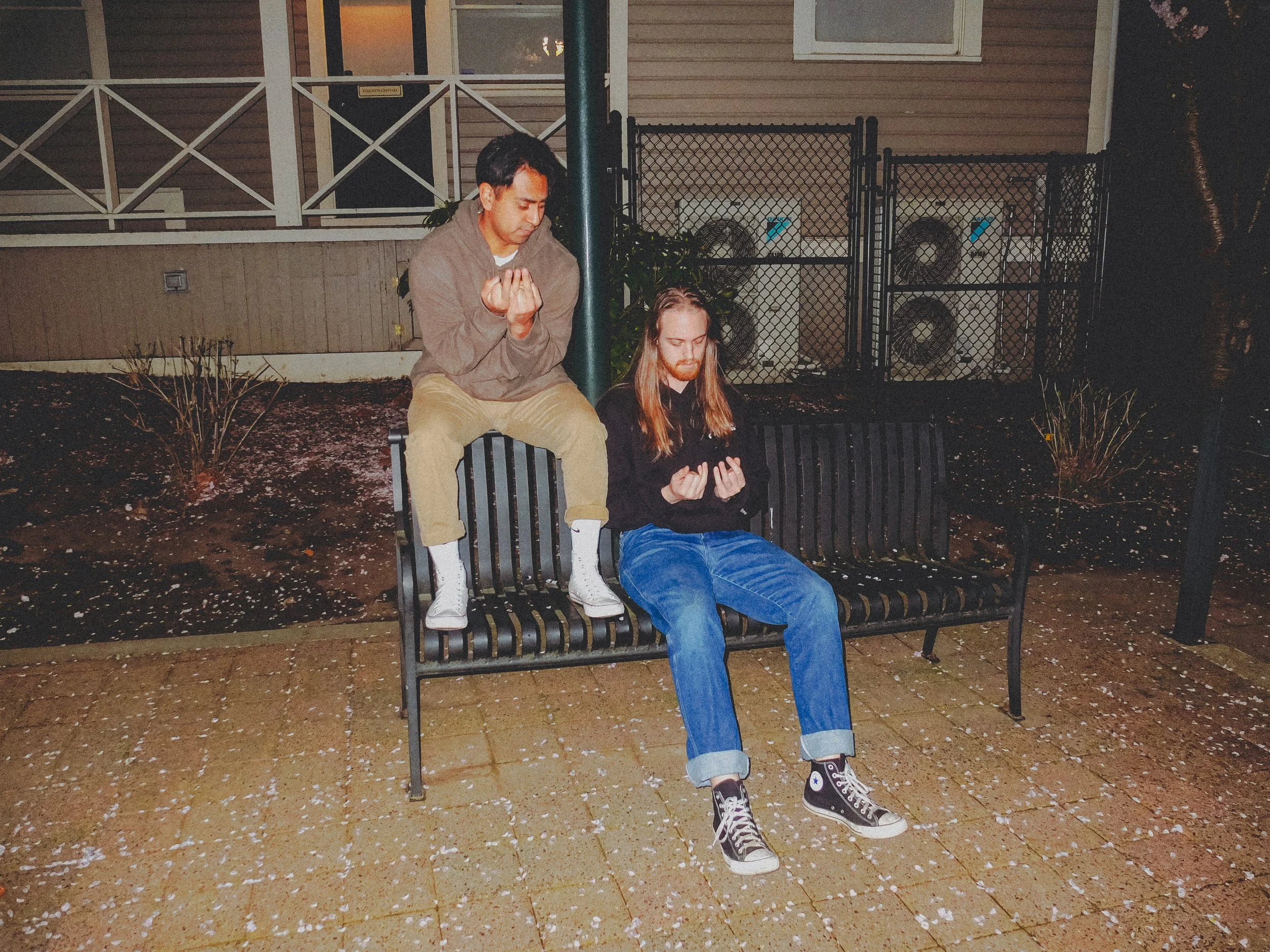 AJ Miranda Photography Candid, unpolished band photography from the Raw Reality series of EL Wedos, capturing genuine chaos using high-contrast dark flash in Vancouver, WA's deep PNW winter greens.