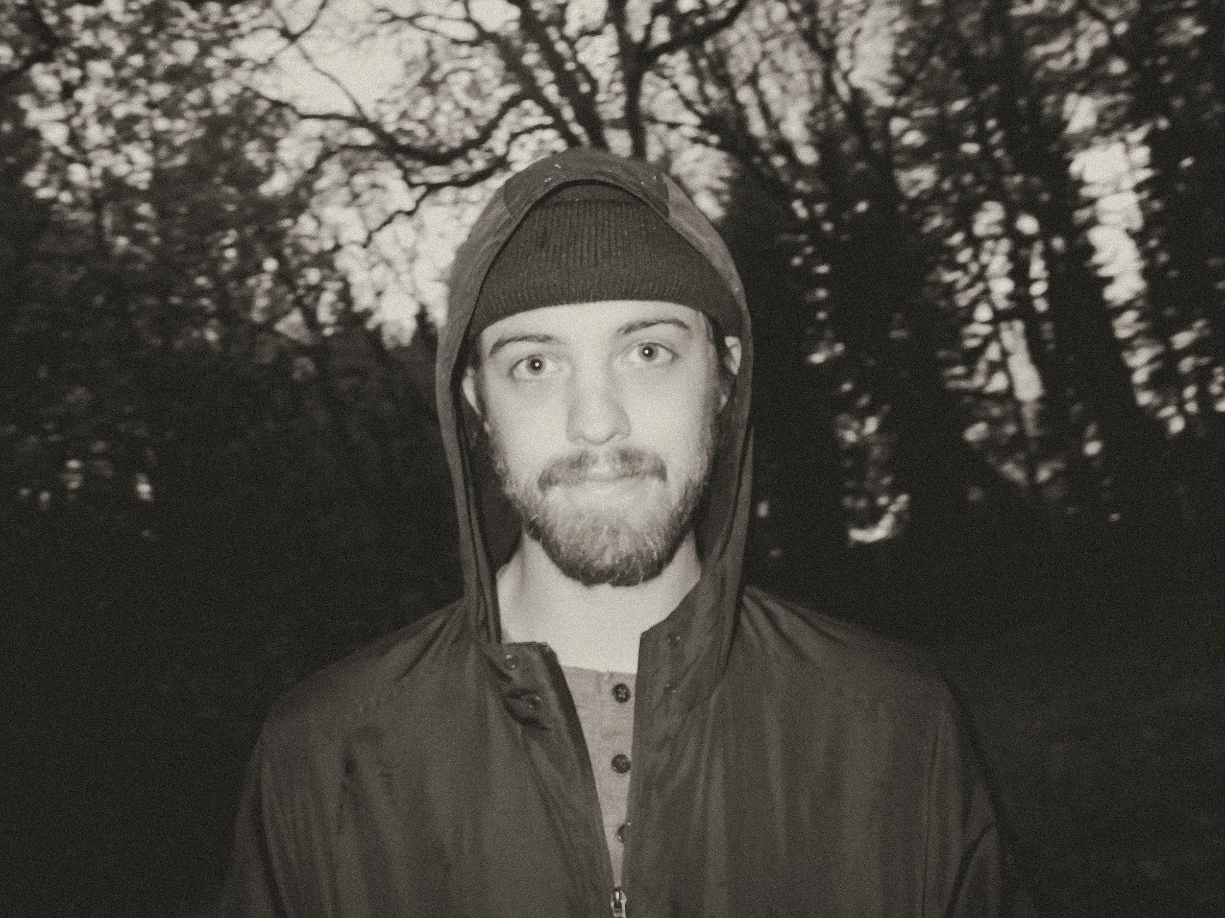 Unpolished band portrait from the Raw Reality series of EL Wedos, emphasizing the high-contrast flash lighting against the deep, irresistible PNW winter and spring greens in Vancouver, WA.