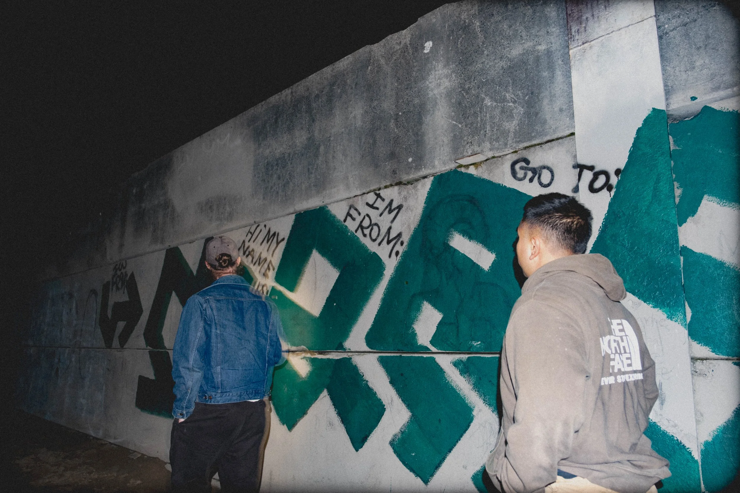 Unpolished band portrait from the Raw Reality series of EL Wedos, emphasizing the high-contrast flash lighting against the deep, irresistible PNW winter and spring greens in Vancouver, WA.