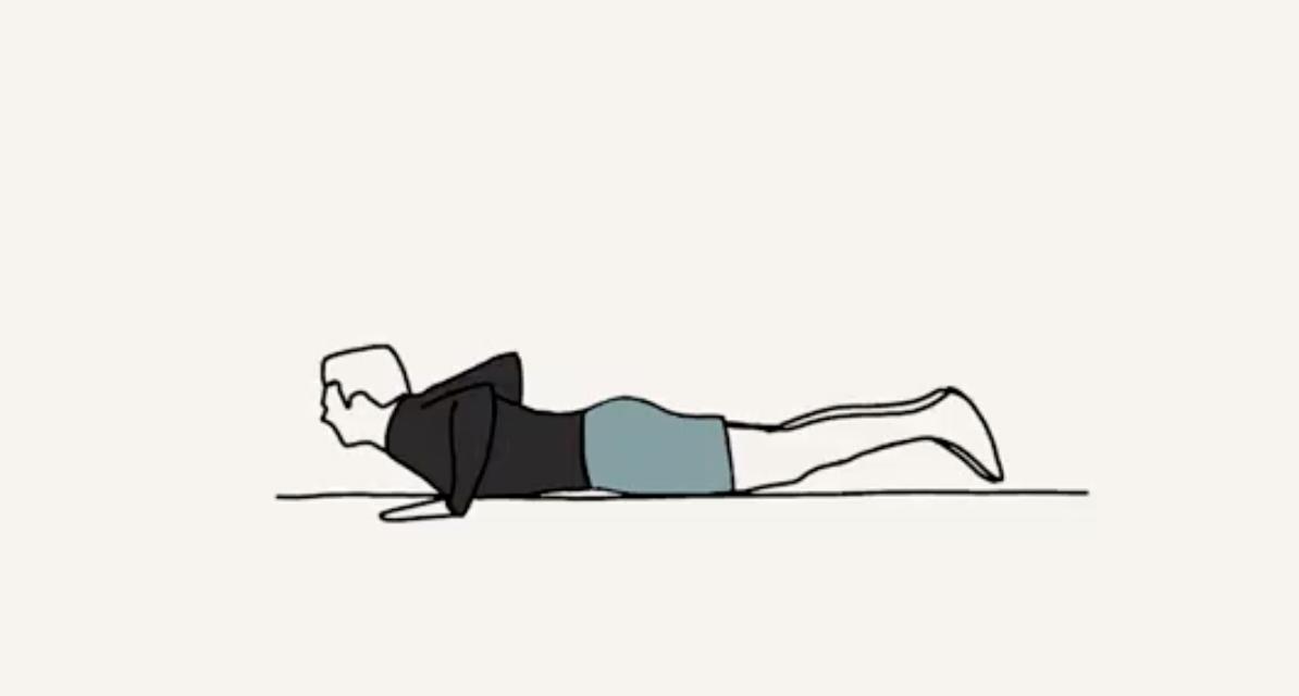 A simple line drawing of a person lying face down on the ground, propped up on their elbows.