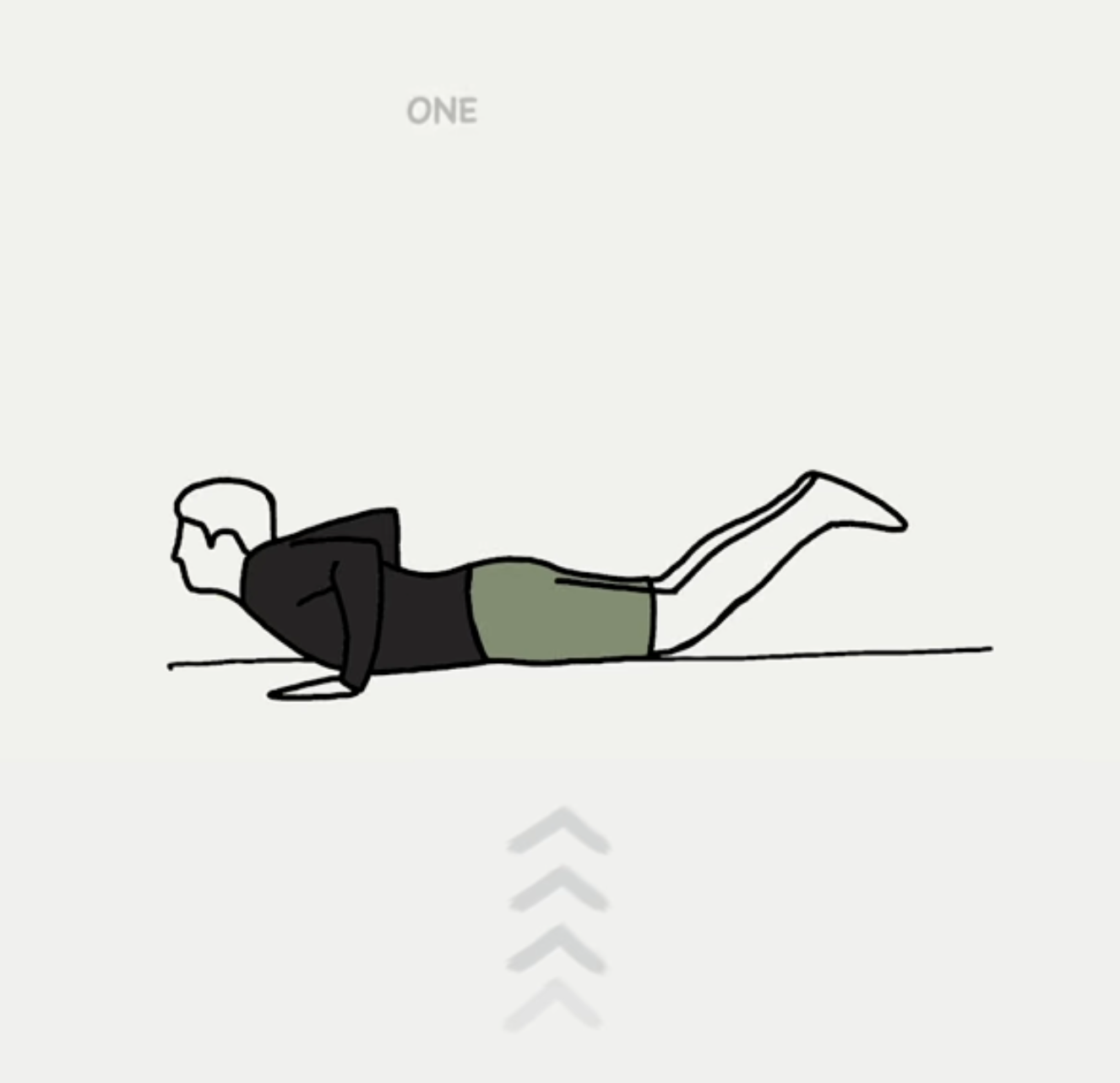 A person doing a push-up exercise on a light-colored floor, wearing a black hoodie and green shorts.