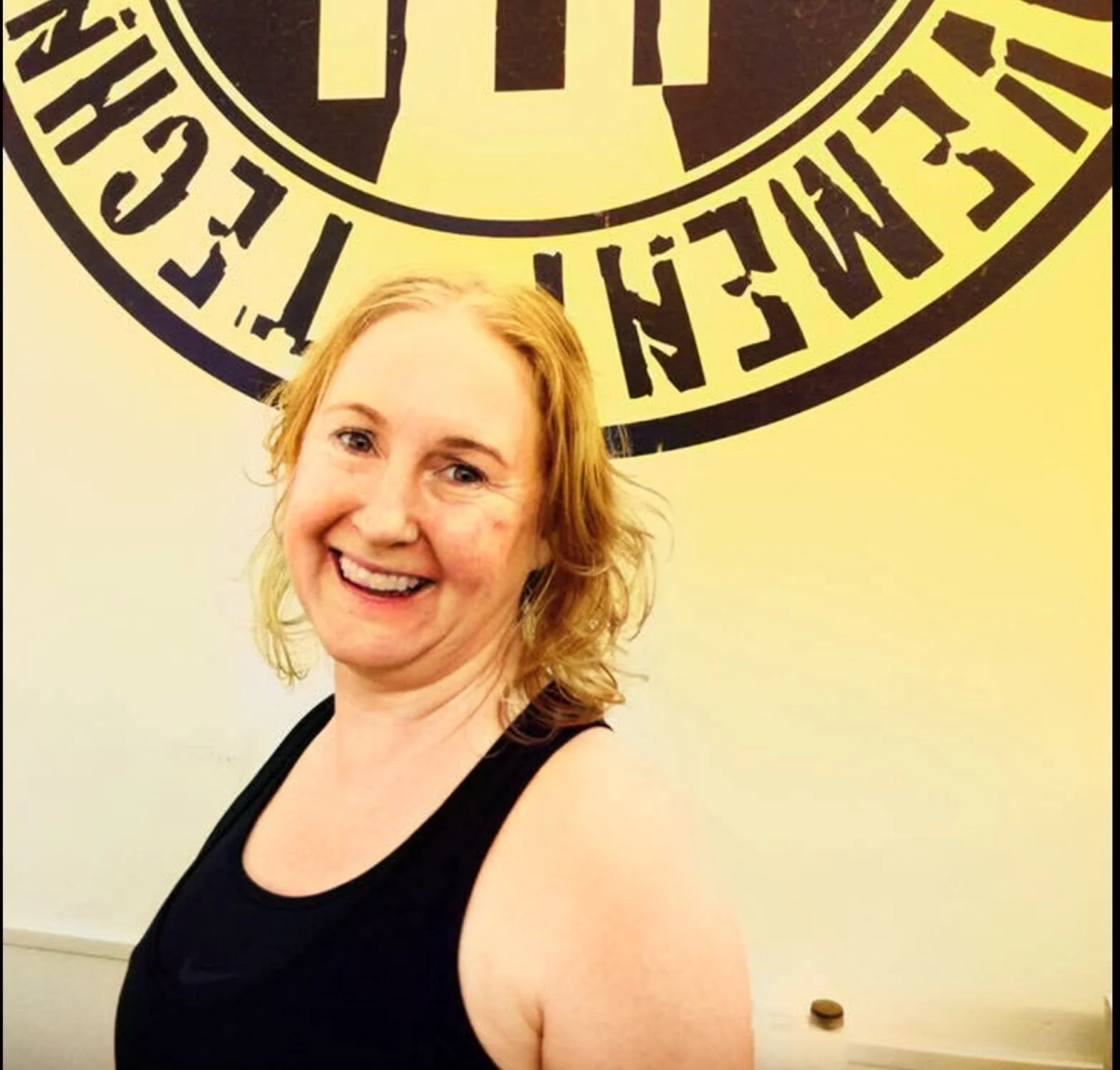 Women encouraging each other at The PIT Personal Training, fostering a positive and inclusive strength training community