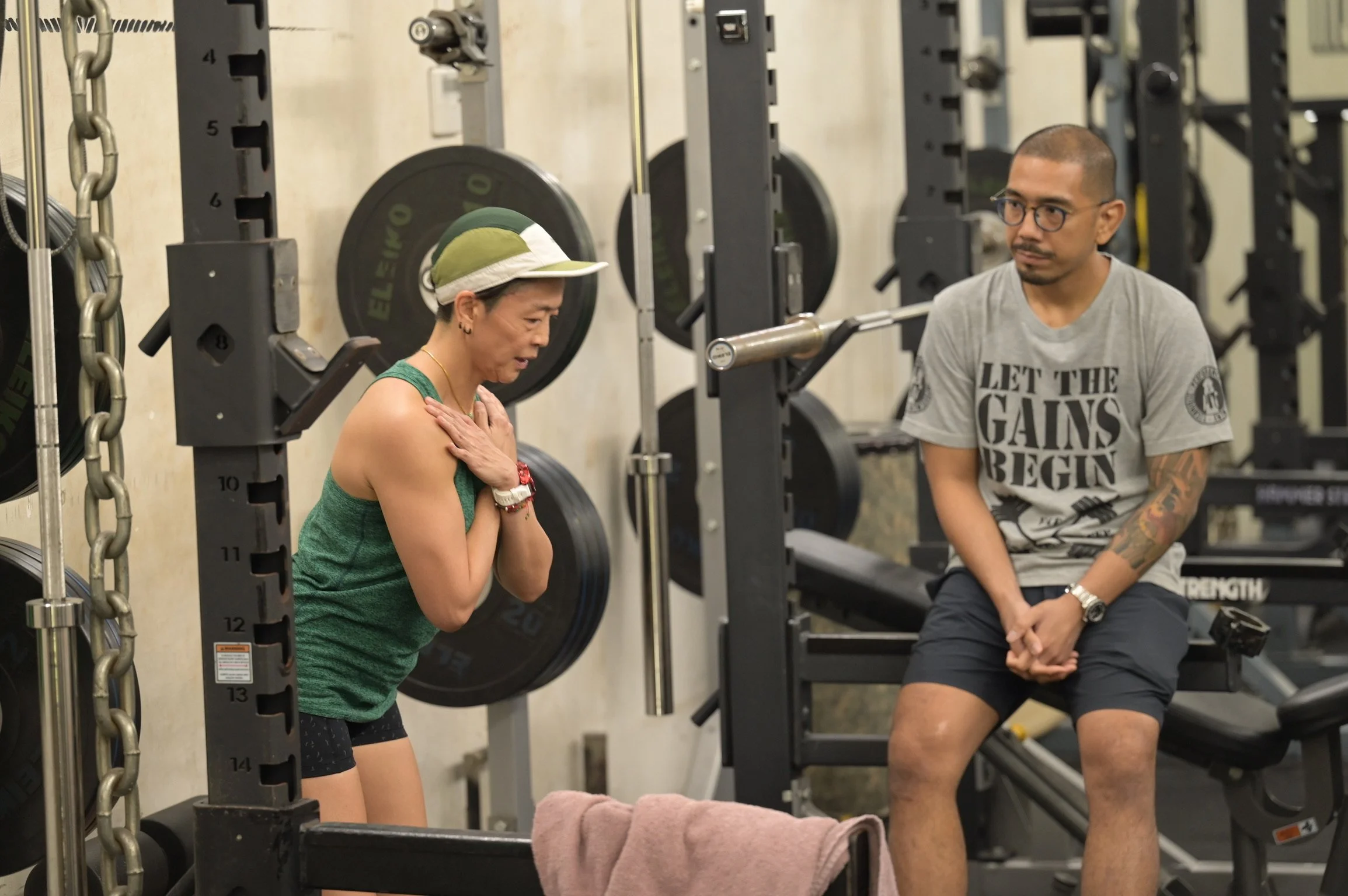 trainer nifal paying attention to clients movement