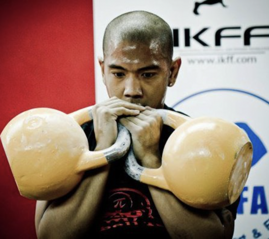 Nifal Johannes Showcasing his kettlebell skills at a competition