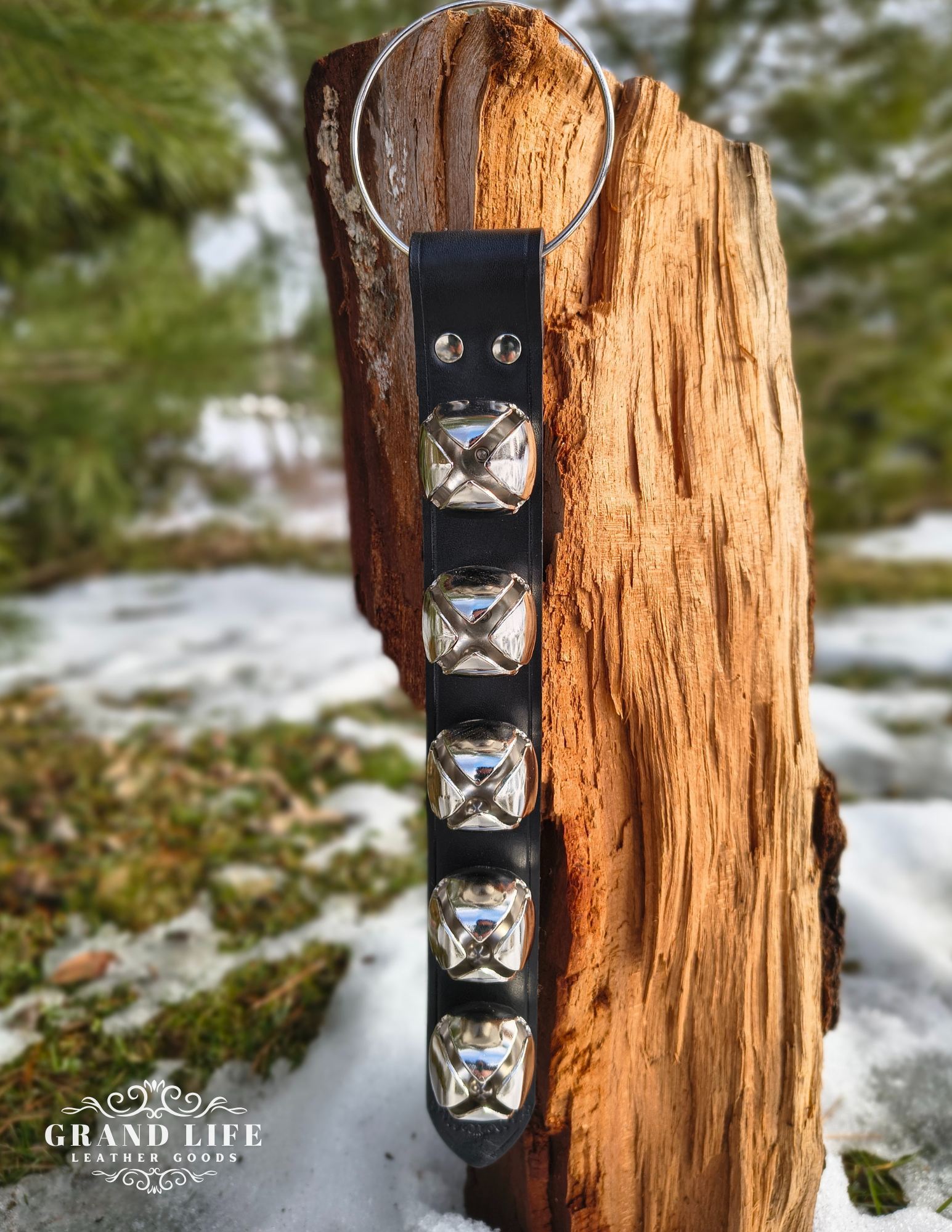 Handcrafted Leather Sleigh Bell Door Hanger - Five Bell silver on black strap.png